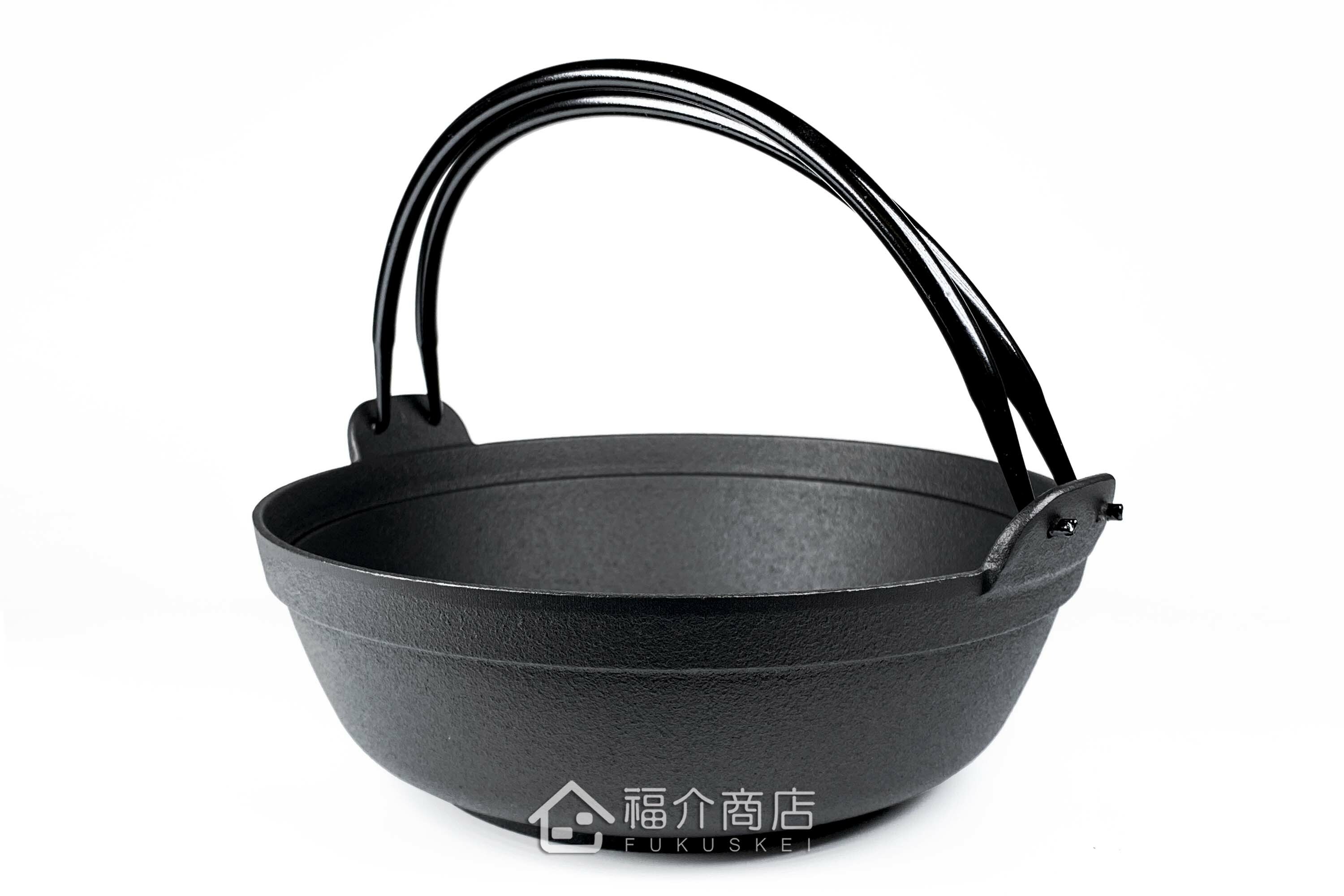 煮火鍋的黑色鐵鍋