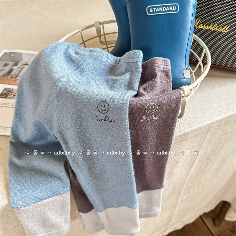 微笑磨毛拼接九分內搭褲