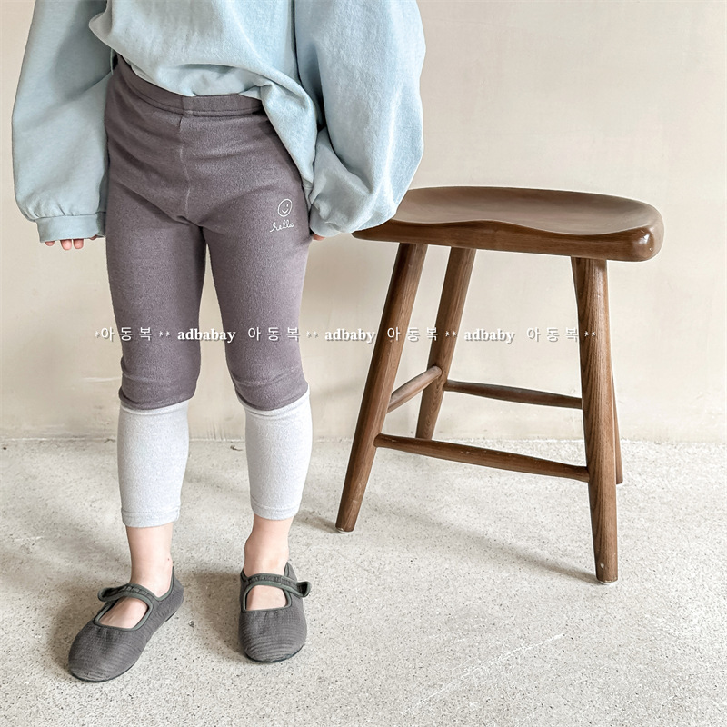 微笑磨毛拼接九分內搭褲