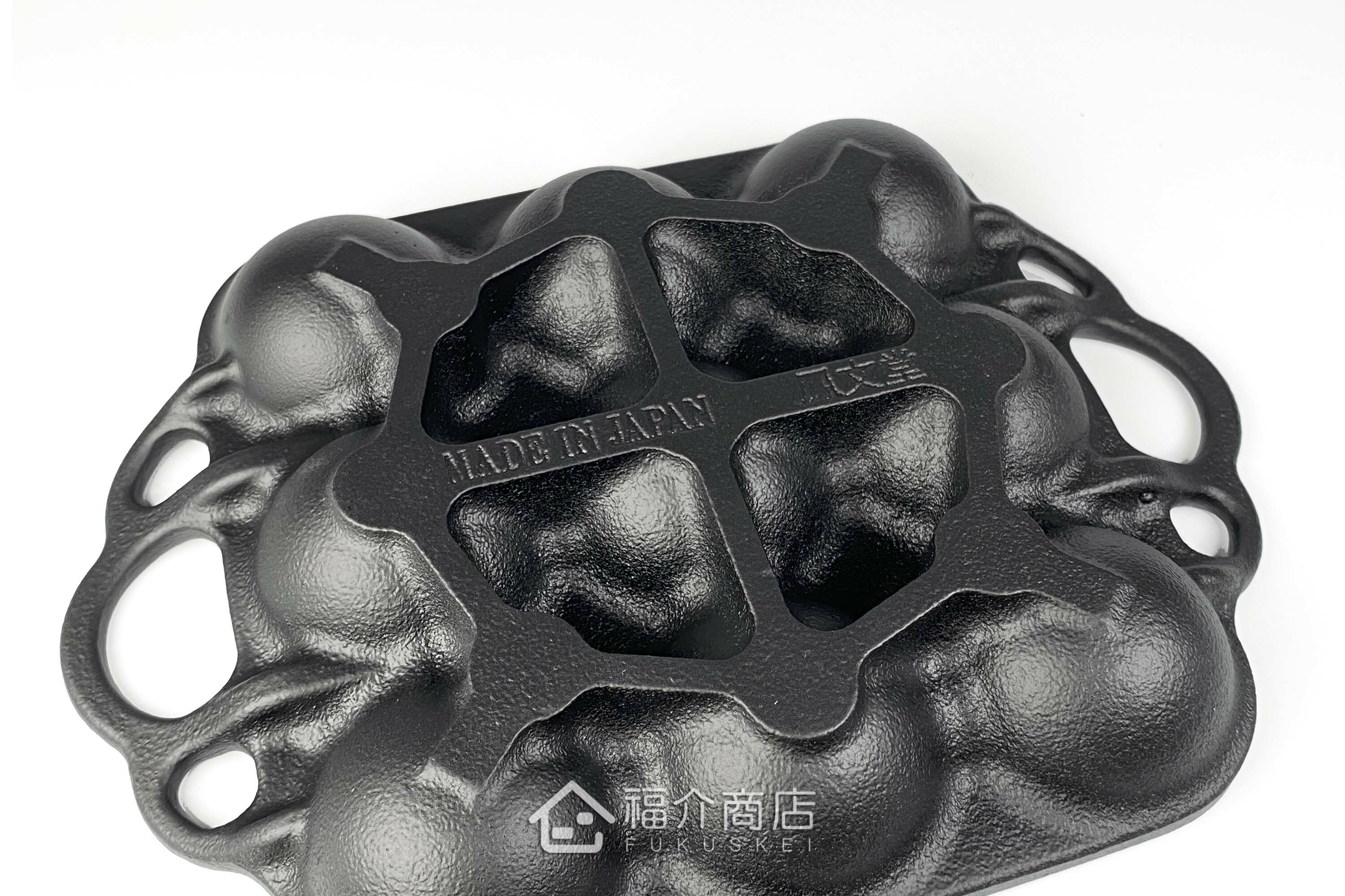 製作章魚燒的鑄鐵烤盤