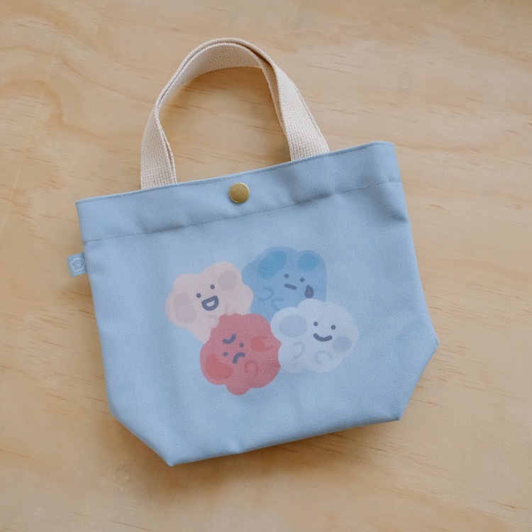 擠成一團 小提袋