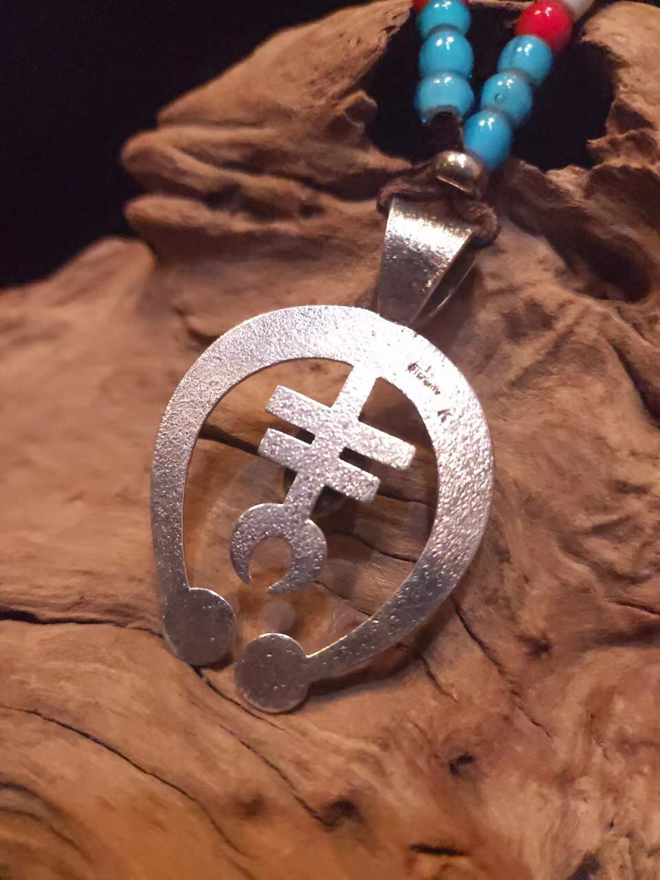 K.Yazzie -Silver Naja with Coral (L)