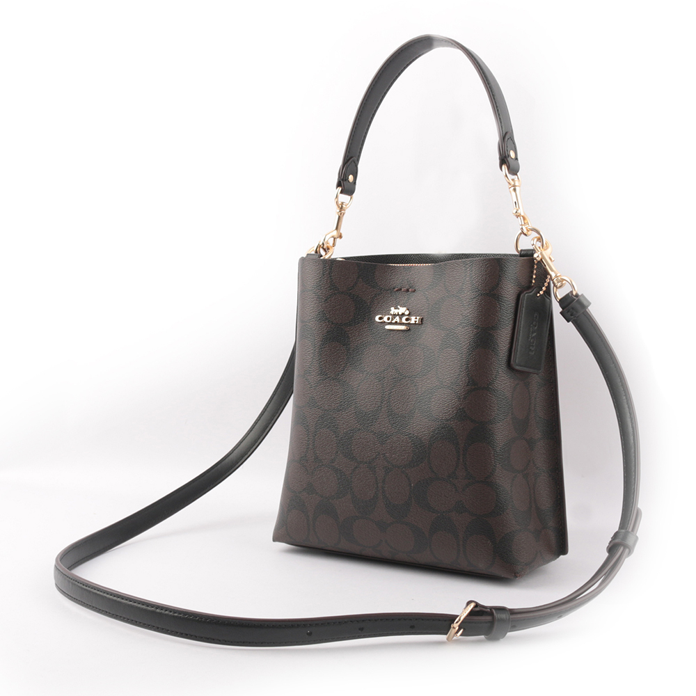【COACH】Mollie 22 塗層帆布二用水桶包(巧克力色)