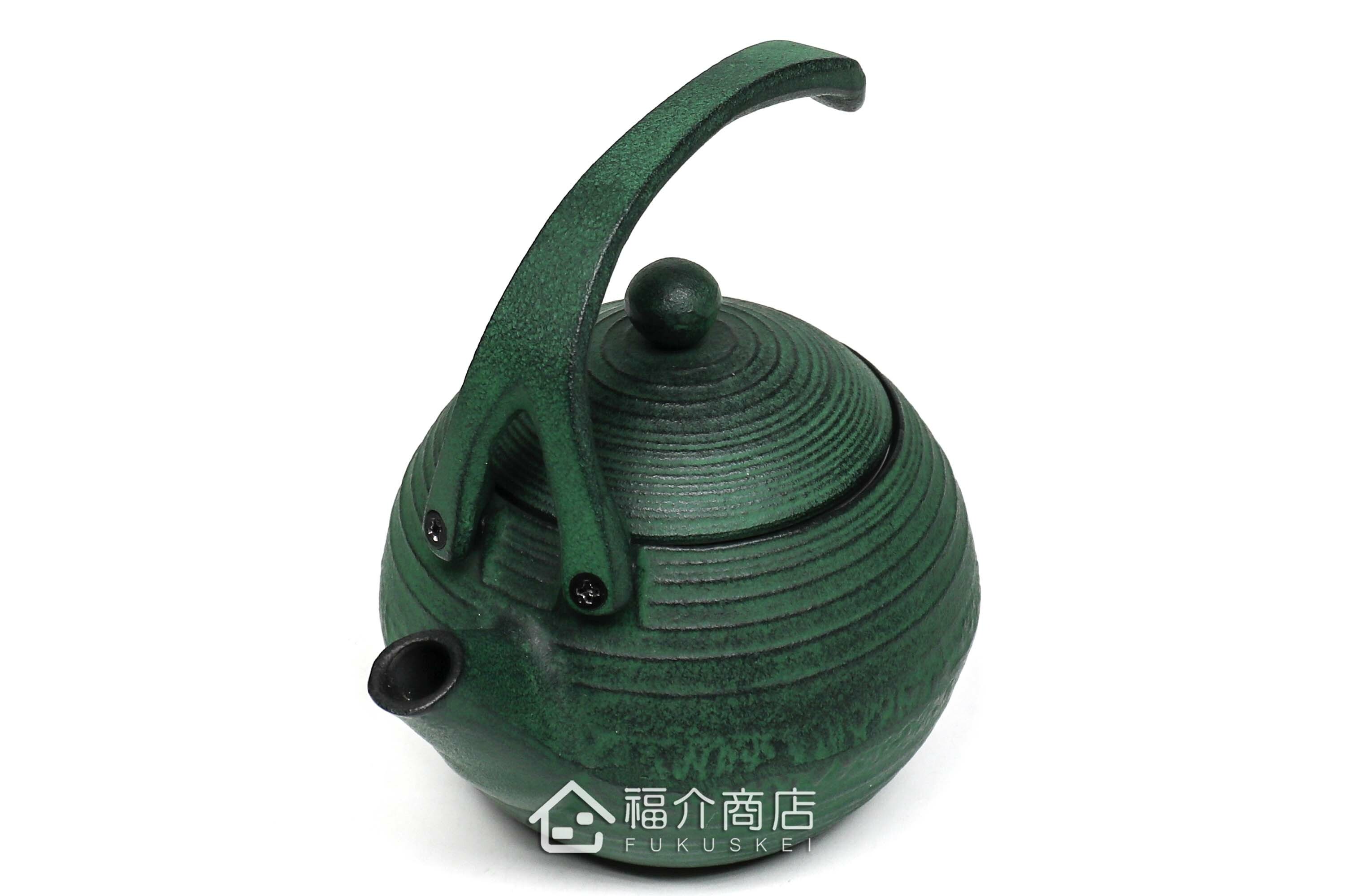 泡茶用的綠色鑄鐵茶壺
