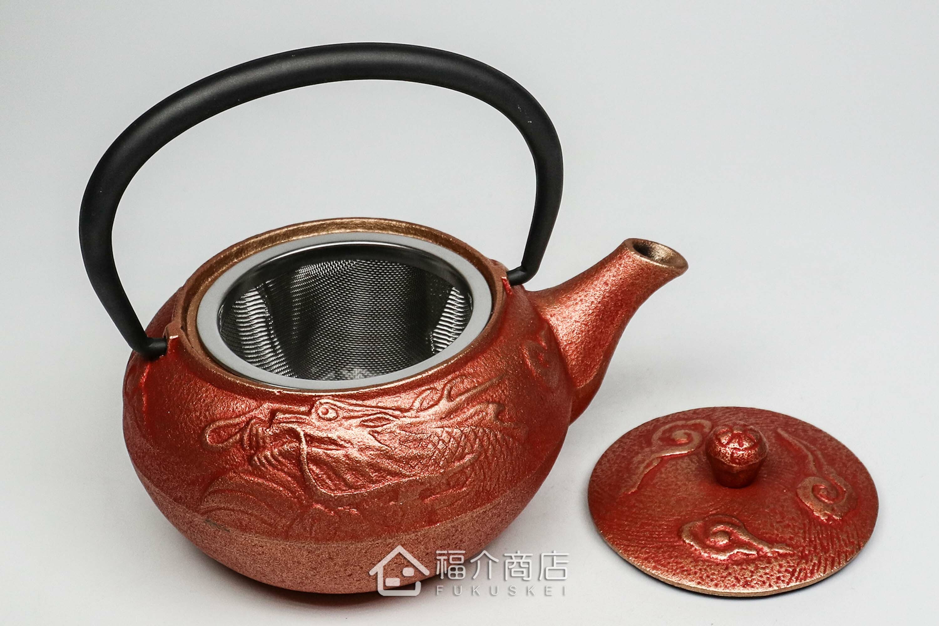 泡茶用的紅金色鑄鐵茶壺附不鏽鋼濾網