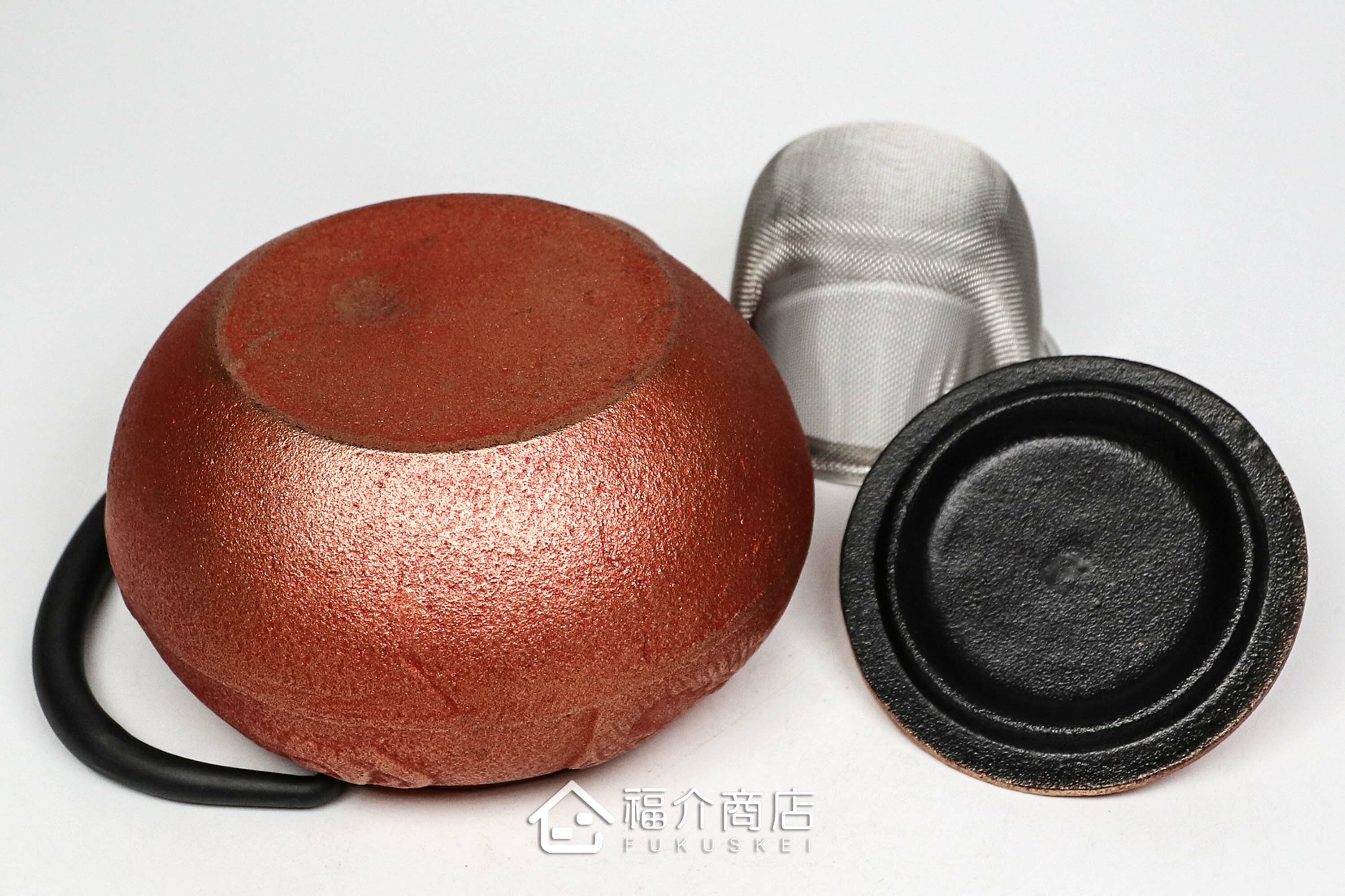 泡茶用的紅金色鑄鐵茶壺附不鏽鋼濾網
