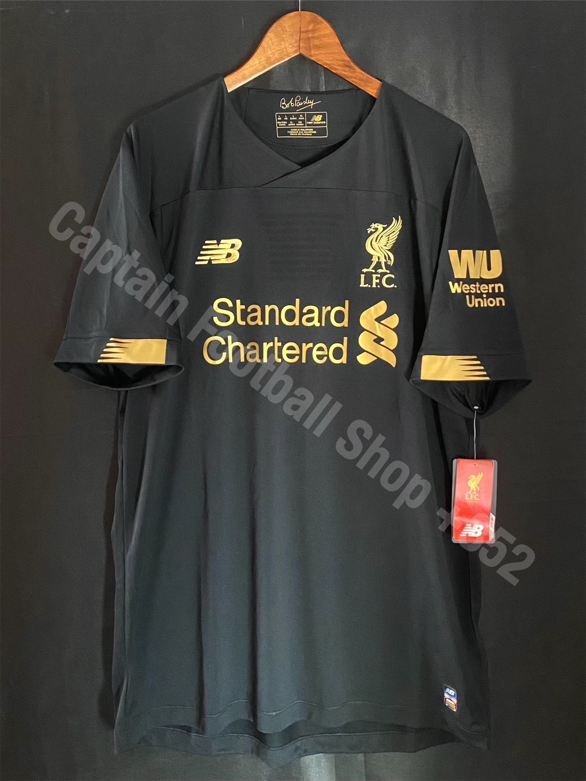 black and gold liverpool kit