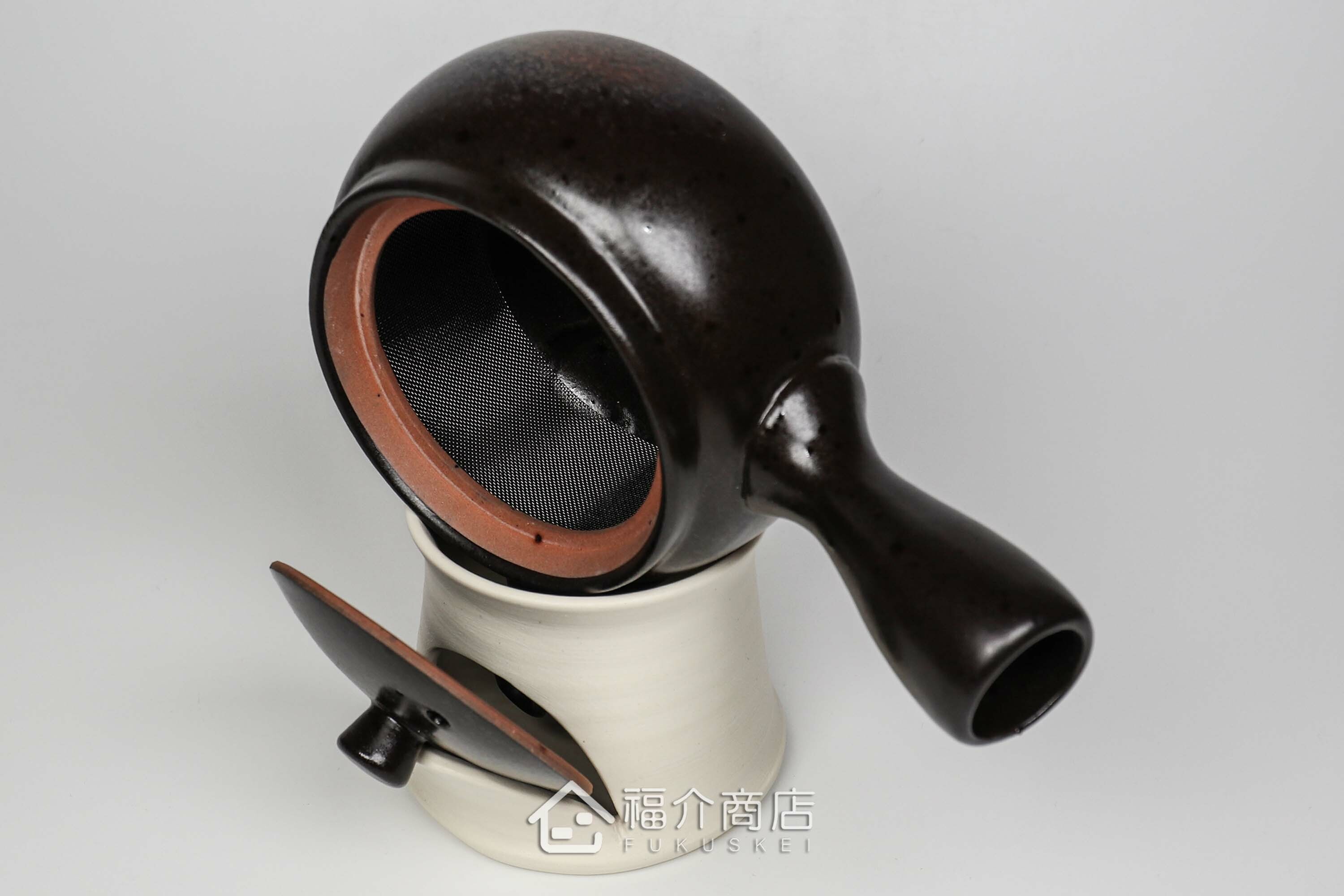 可將使用完的茶壺與壺蓋分開瀝乾的白色蓋架