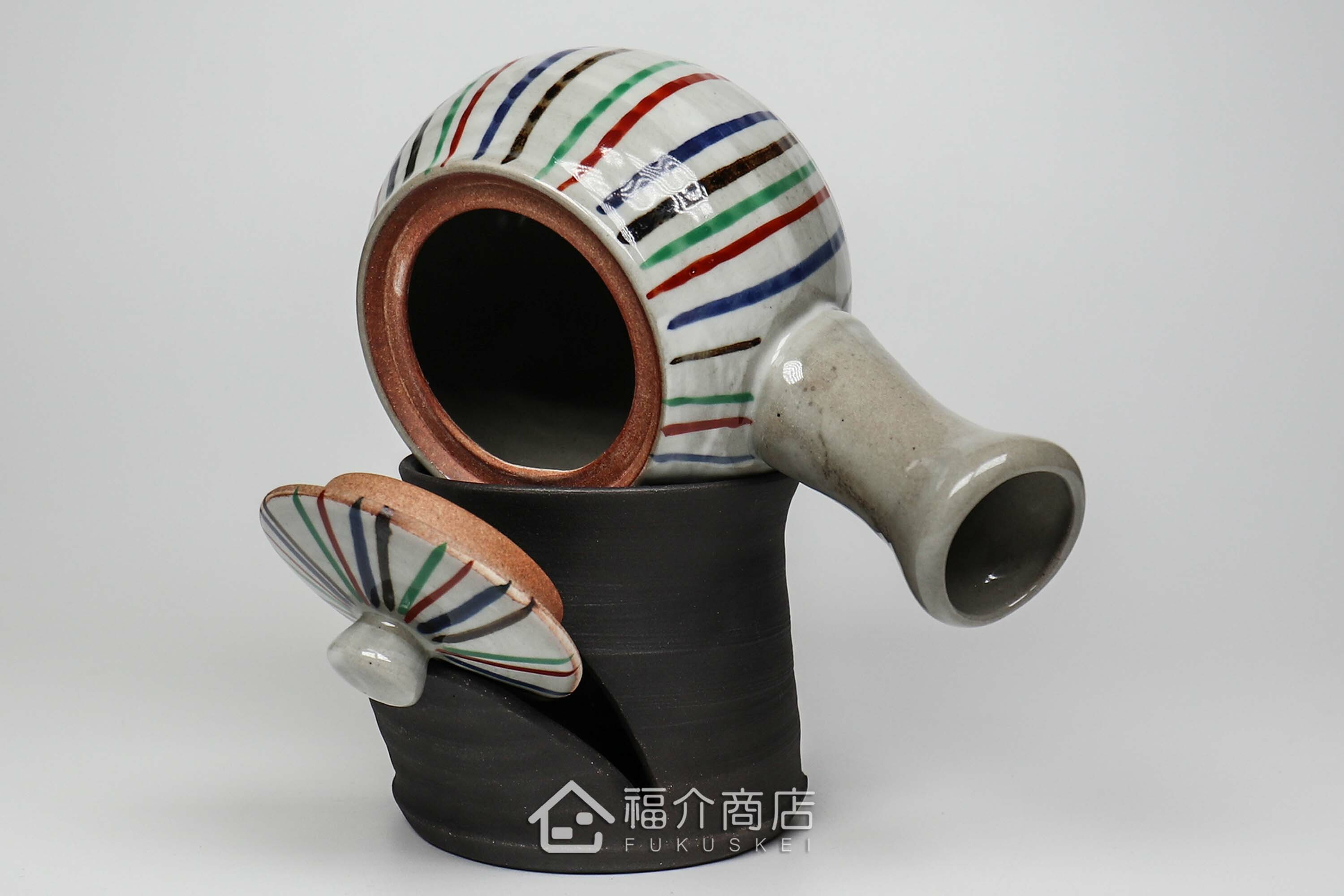 可將使用完的茶壺與壺蓋分開瀝乾的黑色蓋架