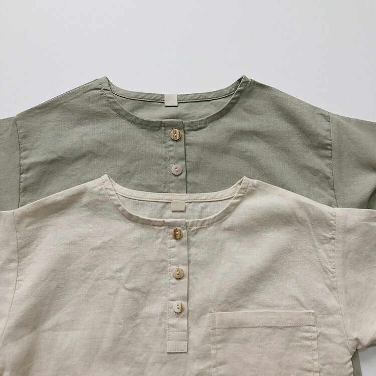 不規則貝殼鈕扣小口袋透氣上衣