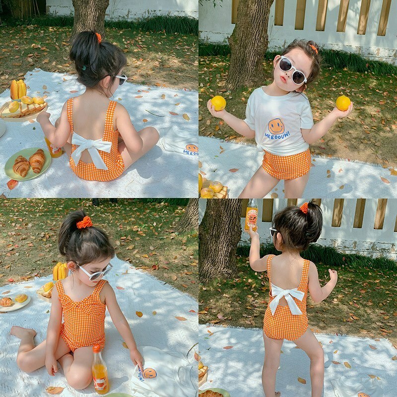 這是可愛的橘蝴蝶結格子泳衣