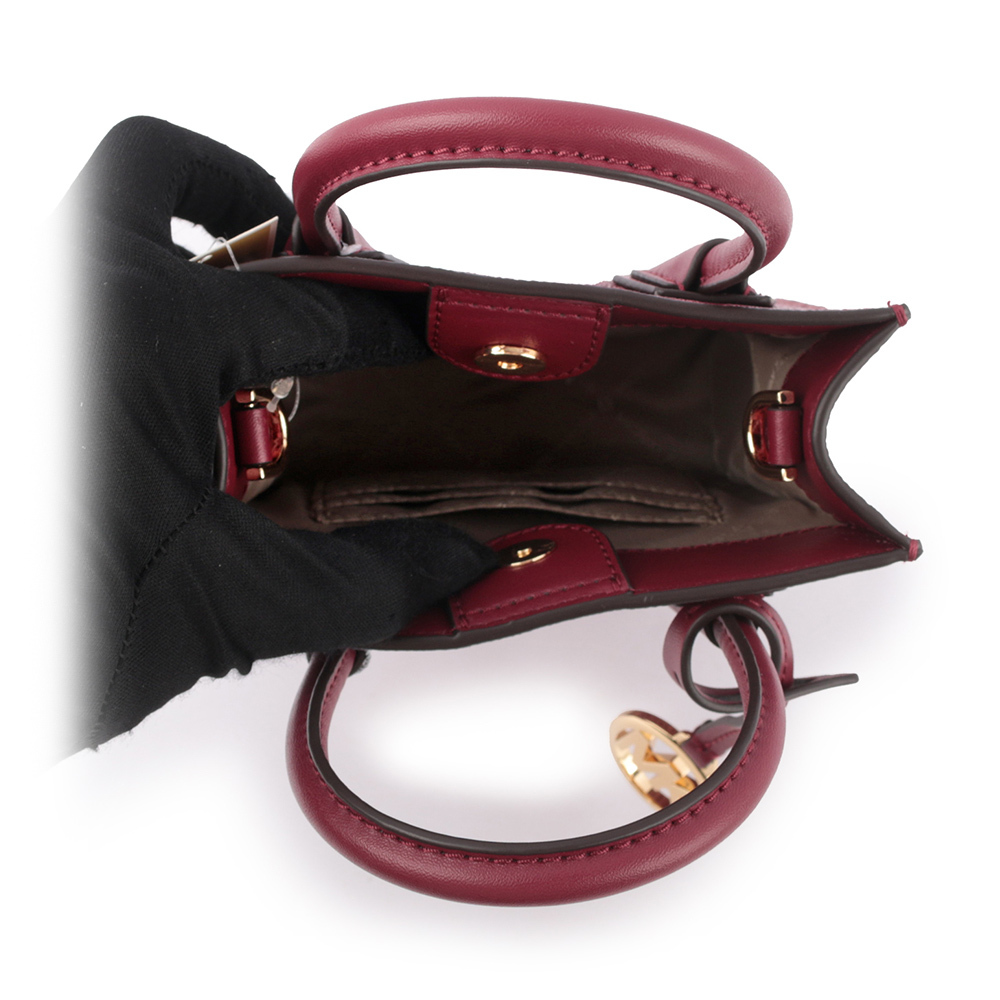 【Michael Kors】Mercer 塗層帆布手提/斜背二用迷你琴譜包(莓紫色)