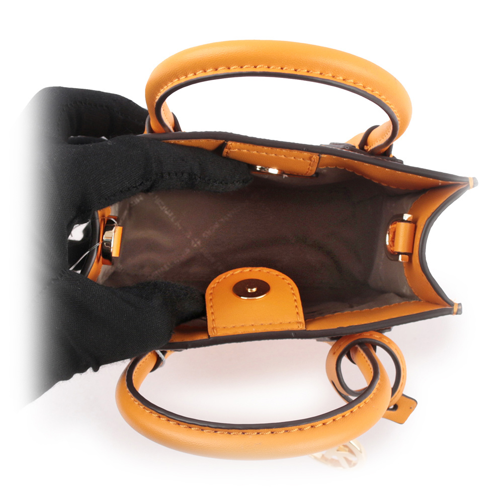 【Michael Kors】Mercer 塗層帆布手提/斜背二用迷你琴譜包(蜂蜜黃)