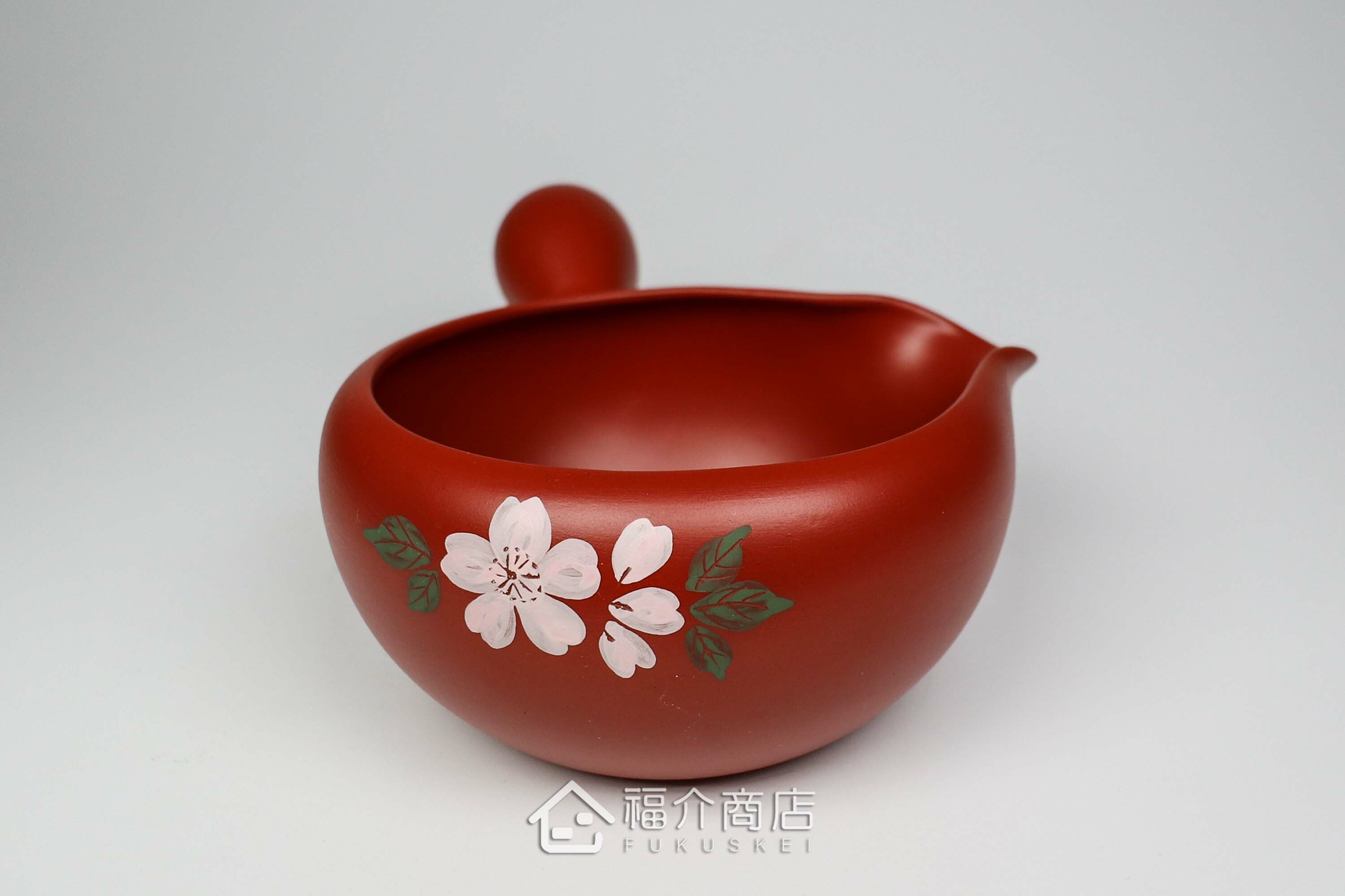 泡茶時將茶水分別倒入杯子的分茶壺