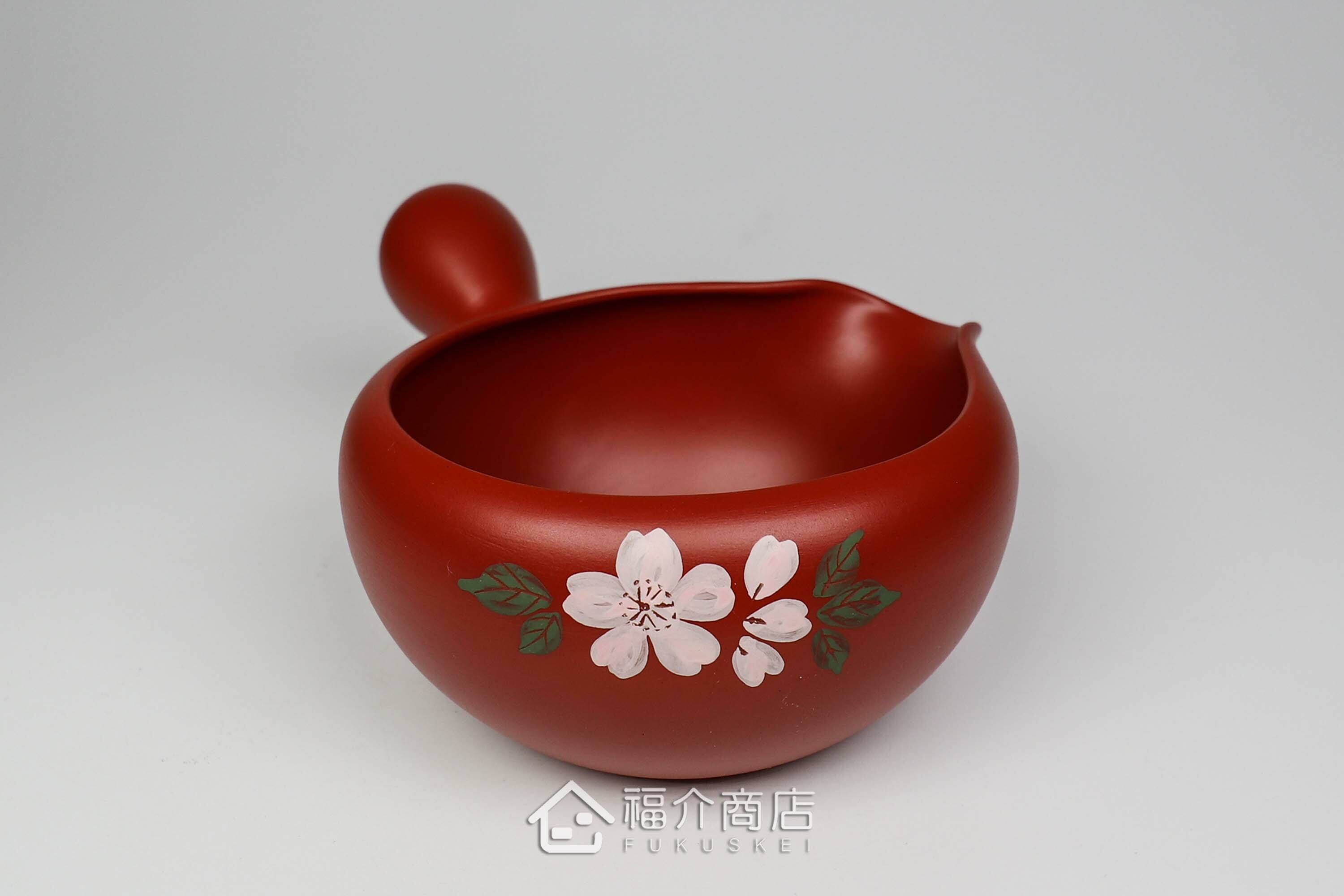 泡茶時將茶水分別倒入杯子的分茶壺