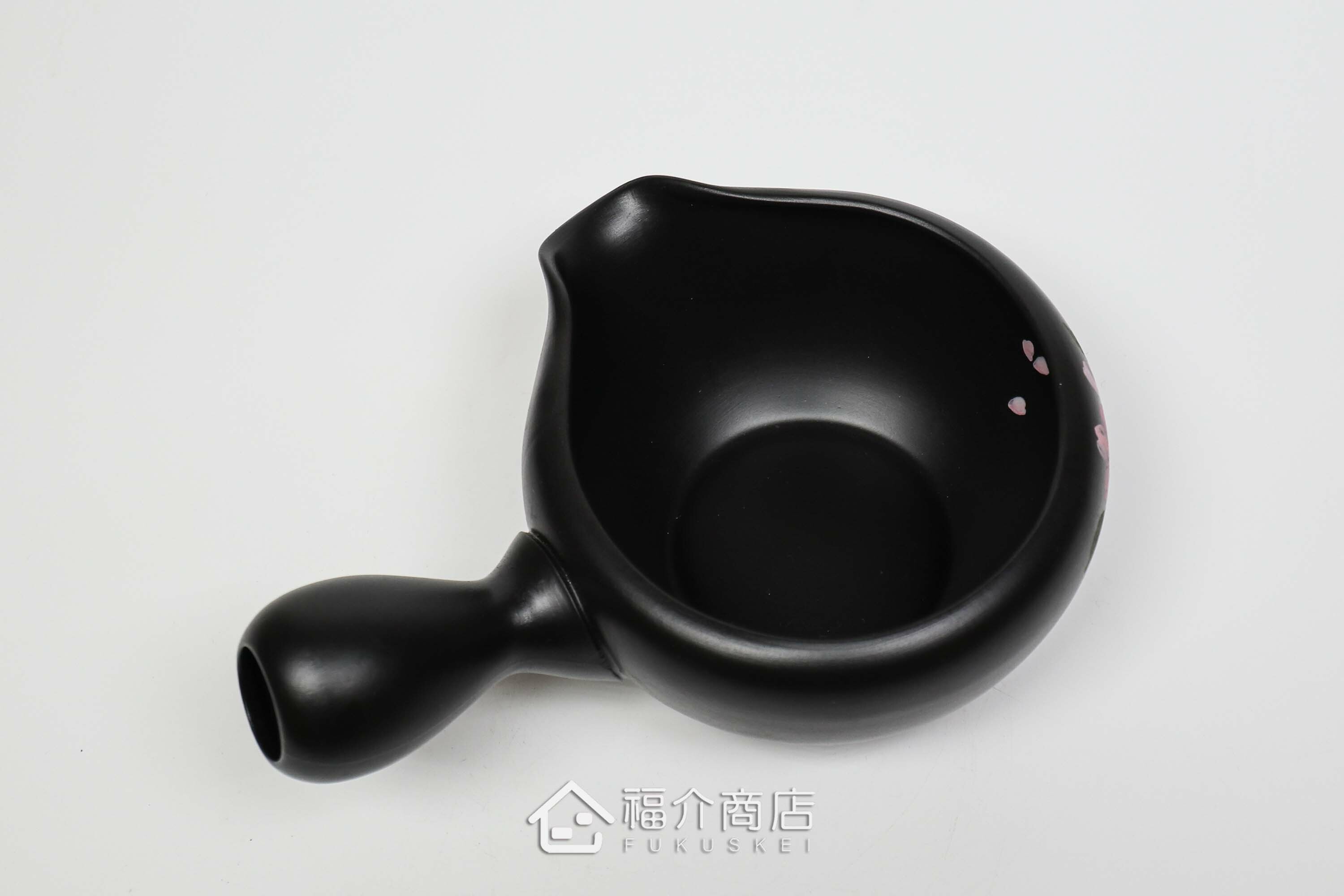 泡茶時將茶水分別倒入杯子的分茶壺