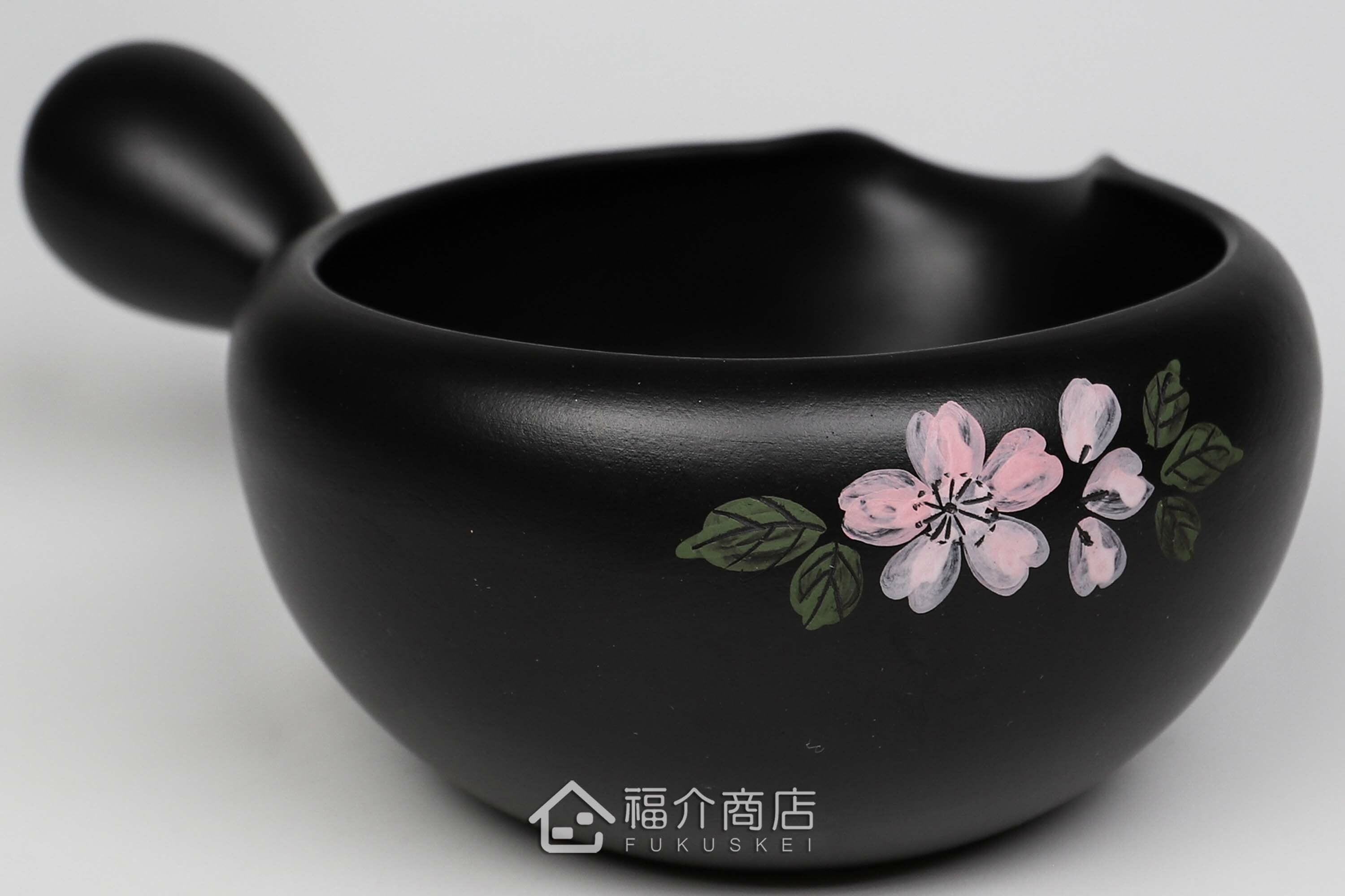 泡茶時將茶水分別倒入杯子的分茶壺