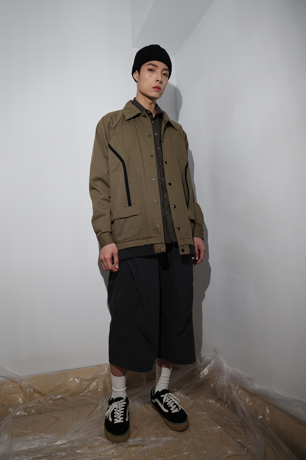 活片剪接七分褲-黑