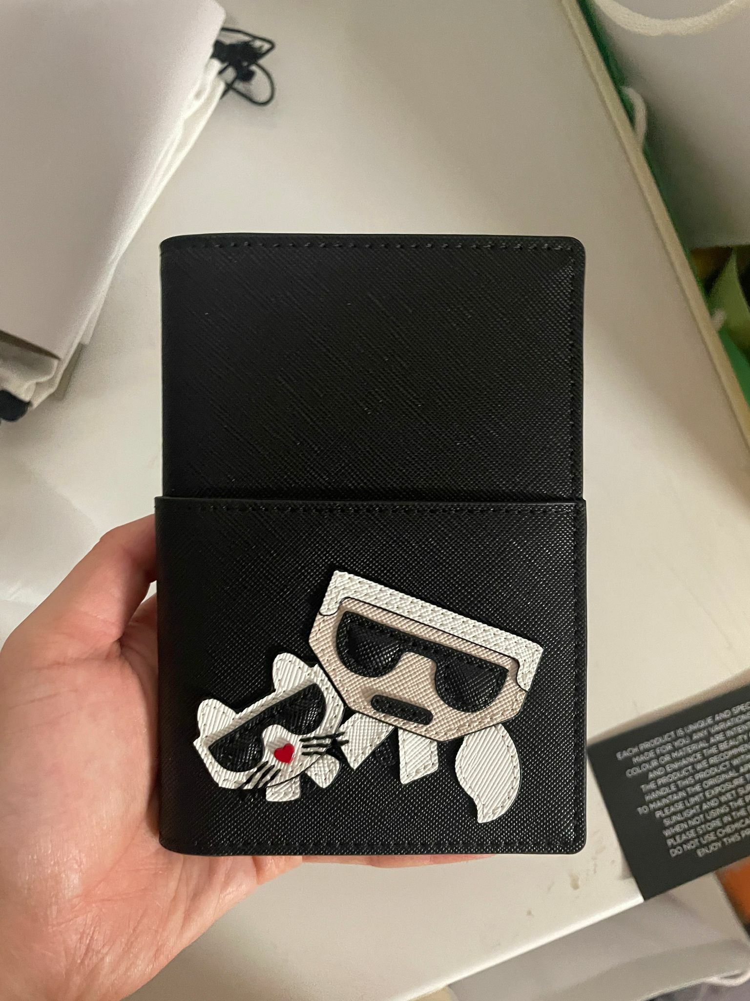 KARL LAGERFELD LEATHER PASSPORT HOLDER WITH CLASSIC LOG