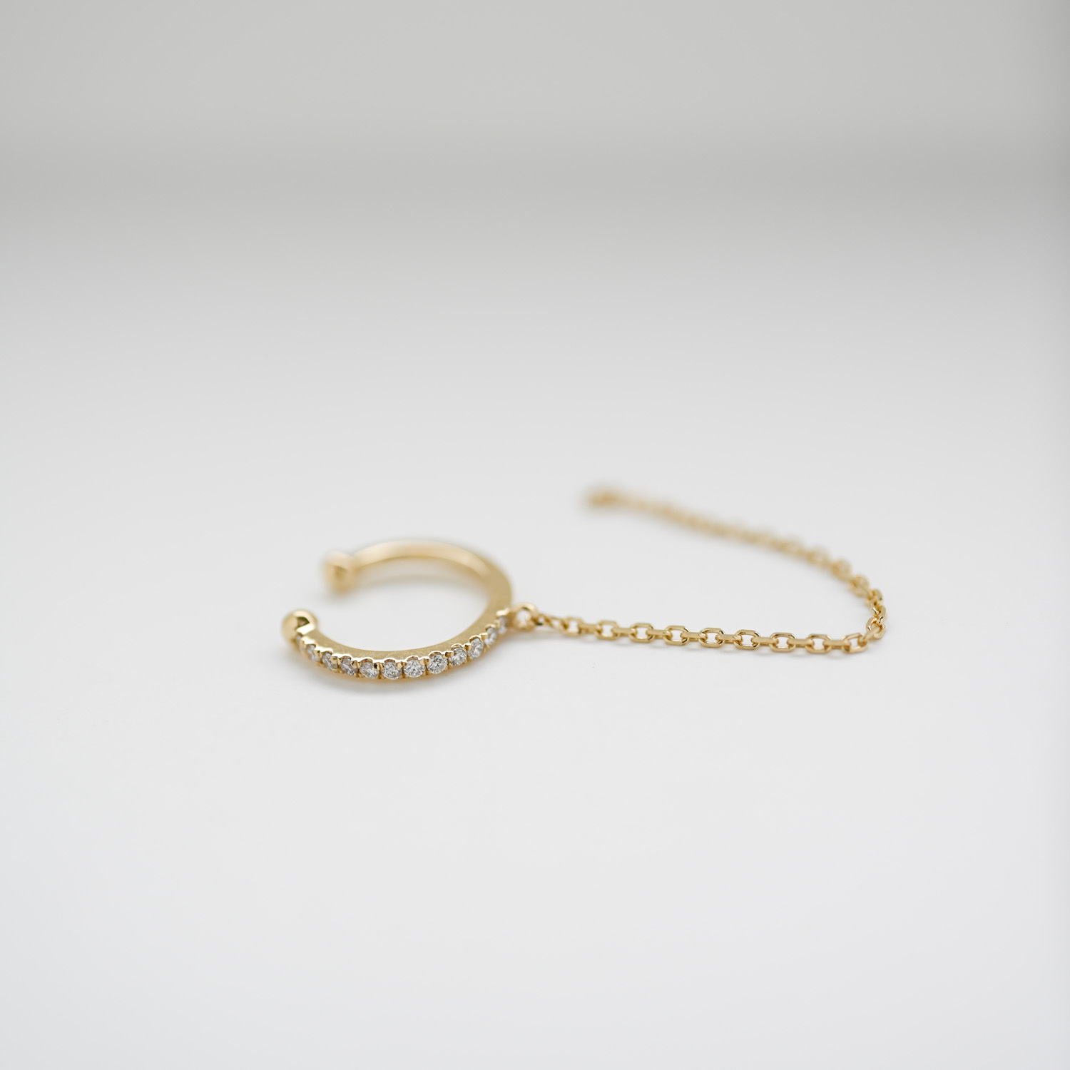 18K Single Diamond Earcuff with chain