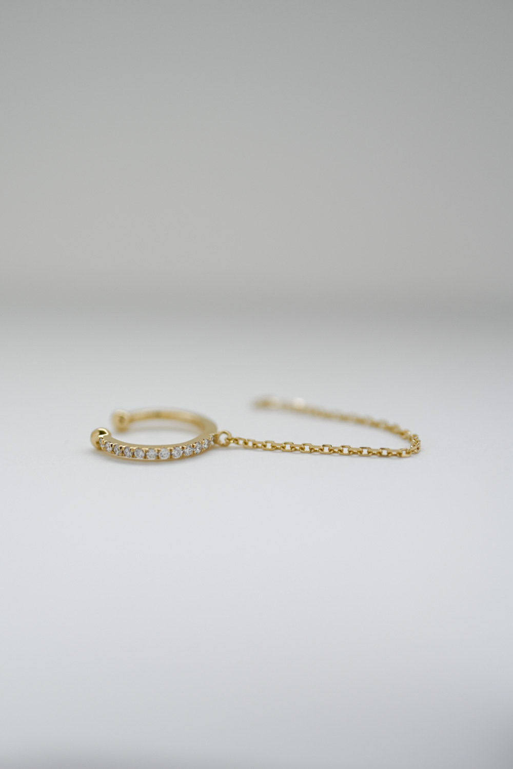 18K Single Diamond Earcuff with chain