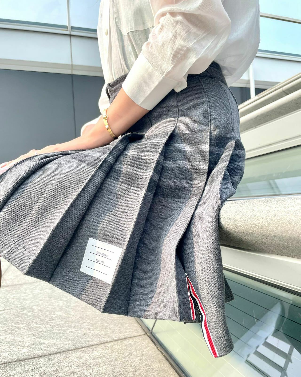 Thom Browne 灰色深灰4間百褶前短後長棉質裙-M