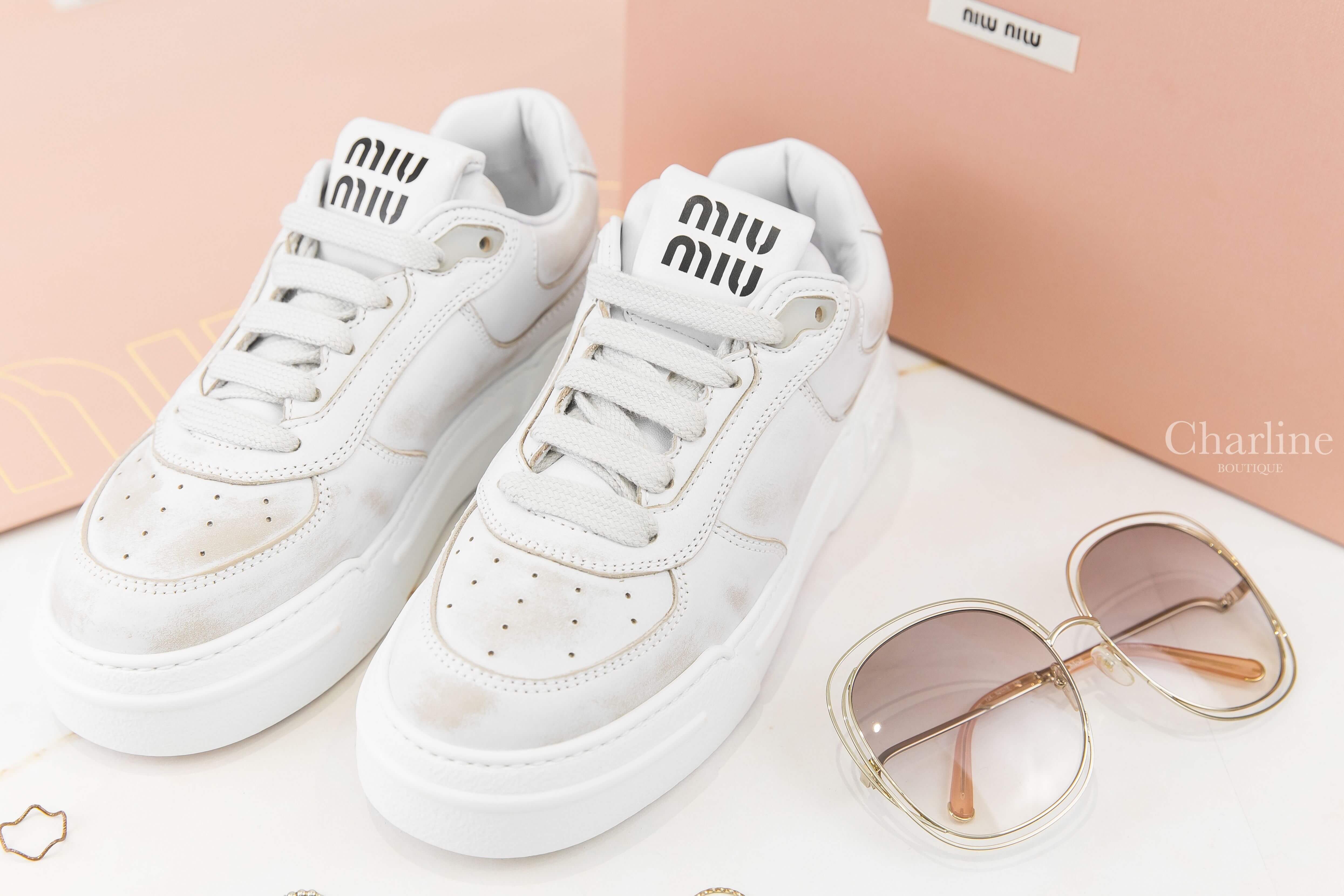 MiuMiu Bleached Leather Sneakers 白色黑色字母仿舊皮革運動鞋-Charline Boutique 精品代購