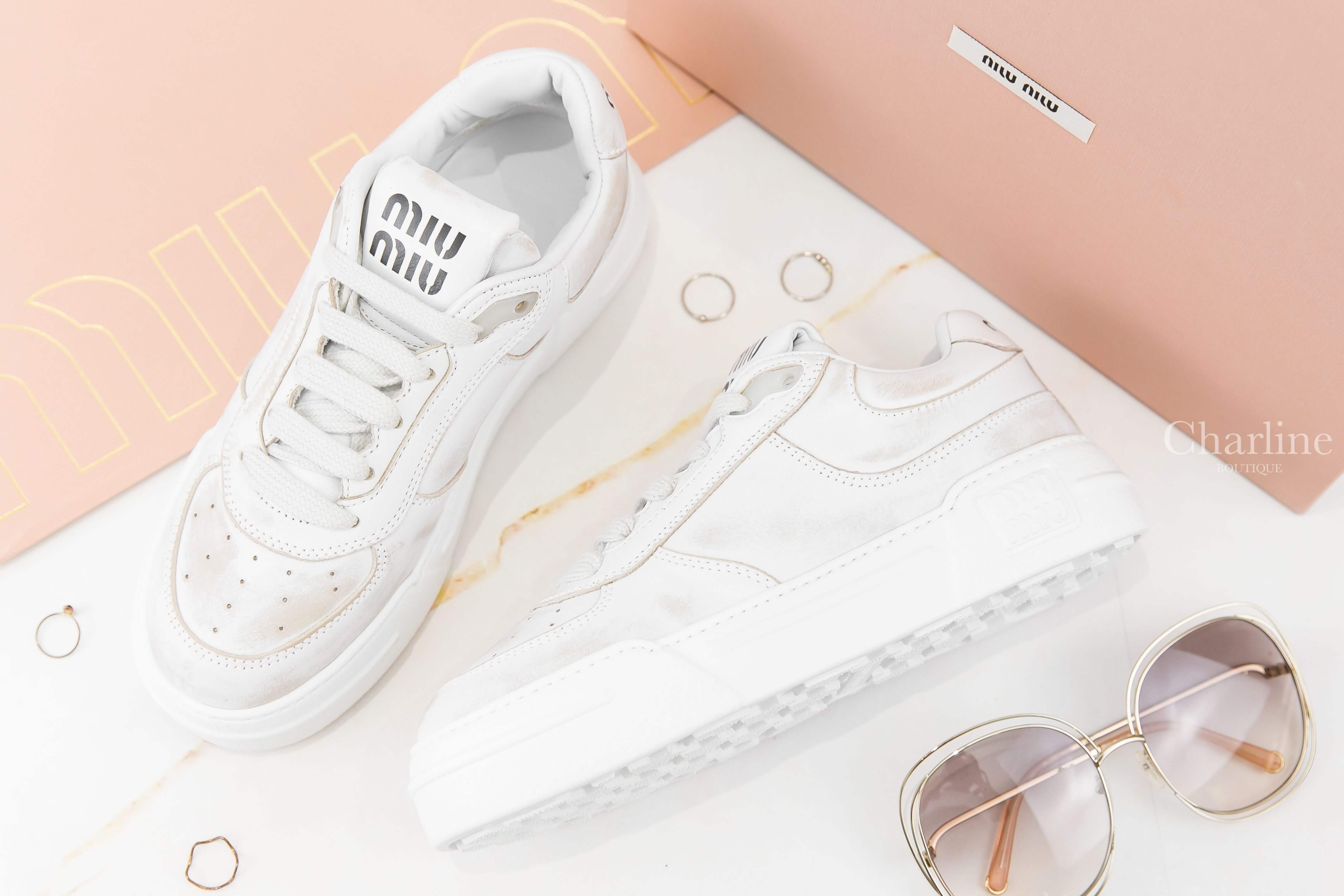 MiuMiu Bleached Leather Sneakers 白色黑色字母仿舊皮革運動鞋-Charline Boutique 精品代購