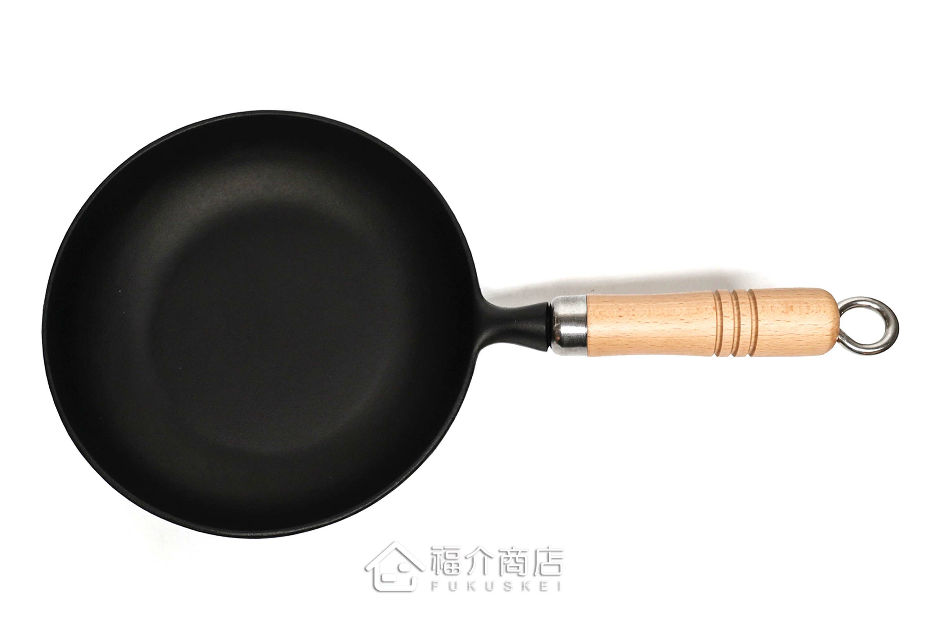 炒菜用的木柄平底鑄鐵鍋