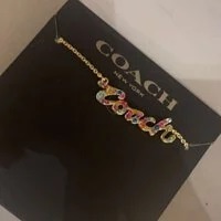 [S] COACH SIGNATURE SCRIPT NECKLACE, GOLD MULTI, 889295457207 (SCO385)
