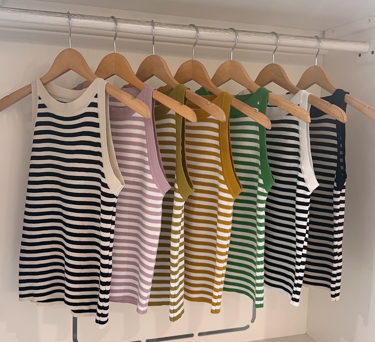 STRIPED CUT IN KNIT TOP