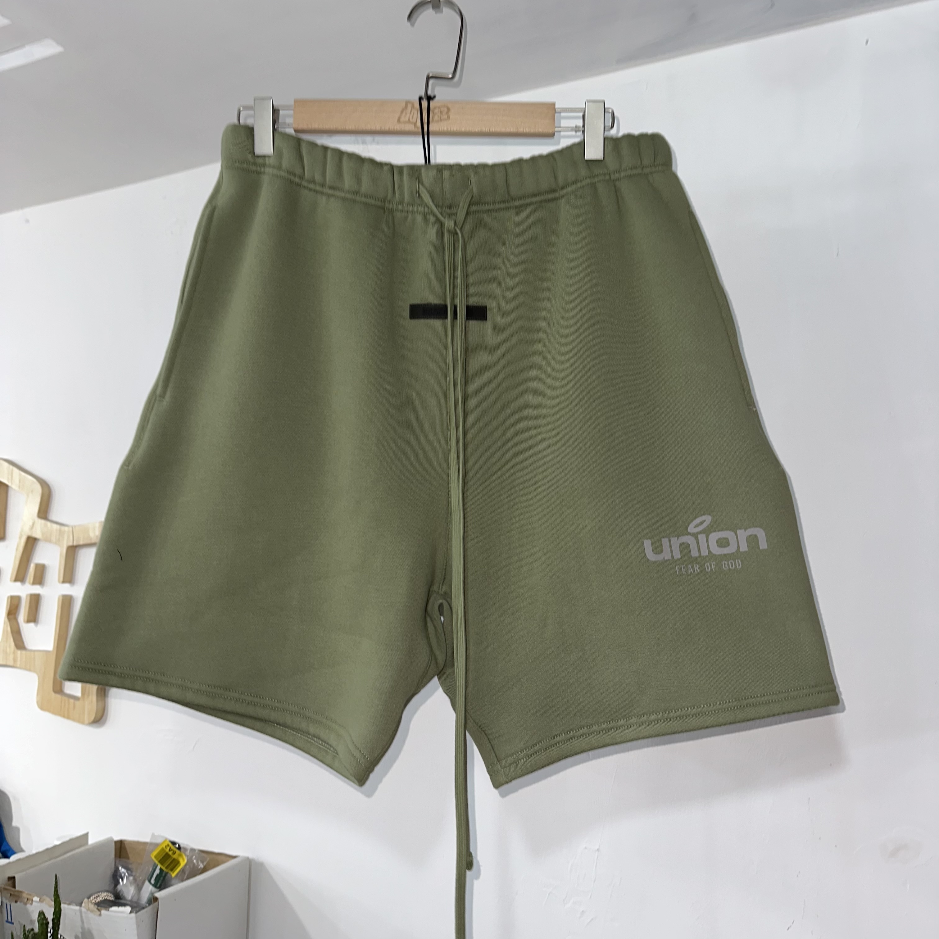 Fear of God Essentials X uinon shorts green