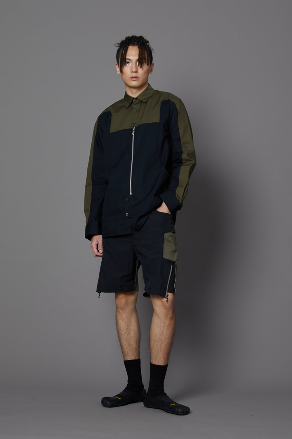 後腰袋透氣短褲-墨綠