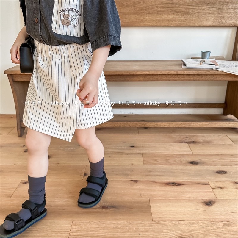 直條紋斜切褲裙