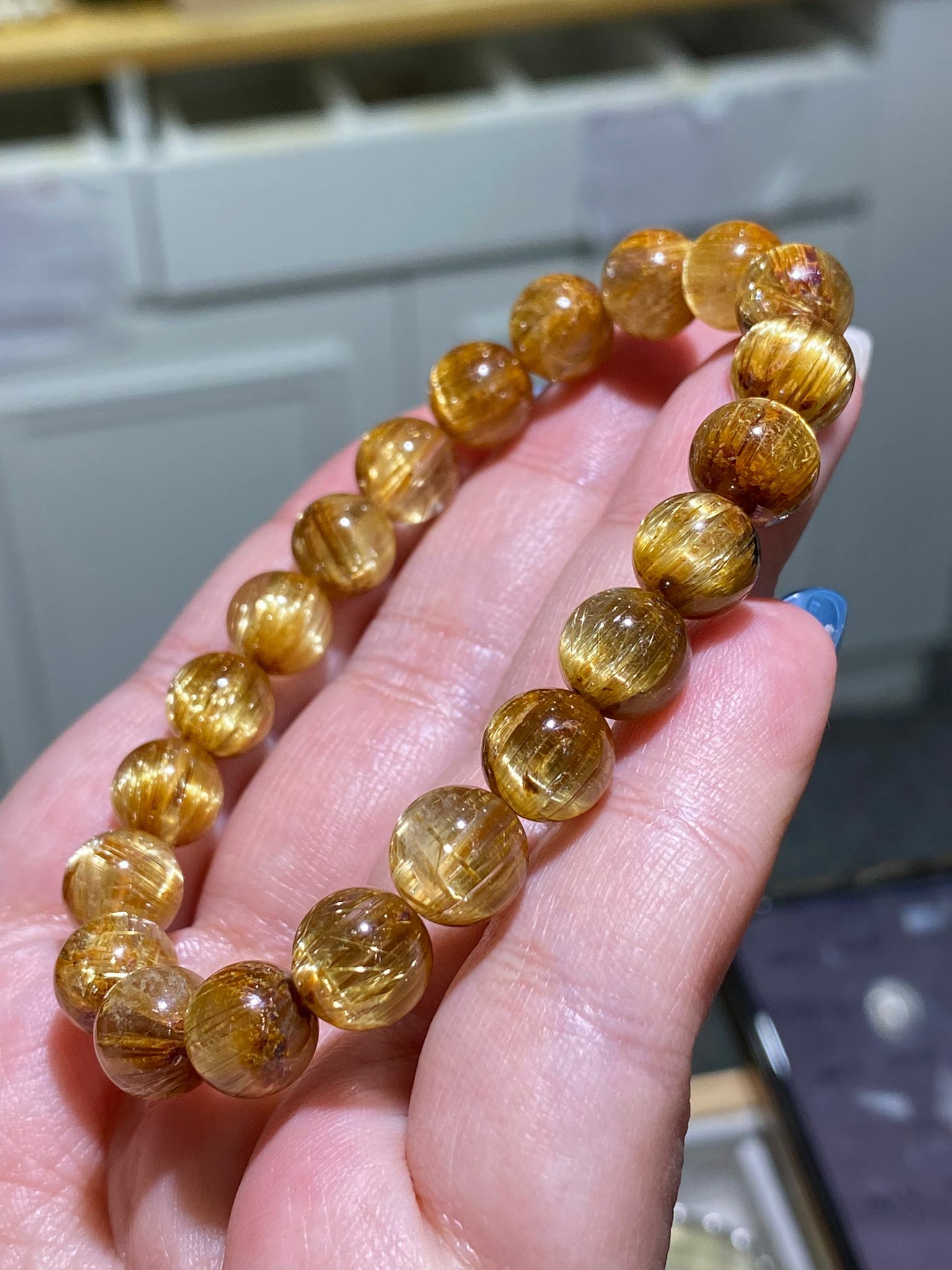 9-9.3mm 頂級貓眼金鈦晶(雞蛋黃)