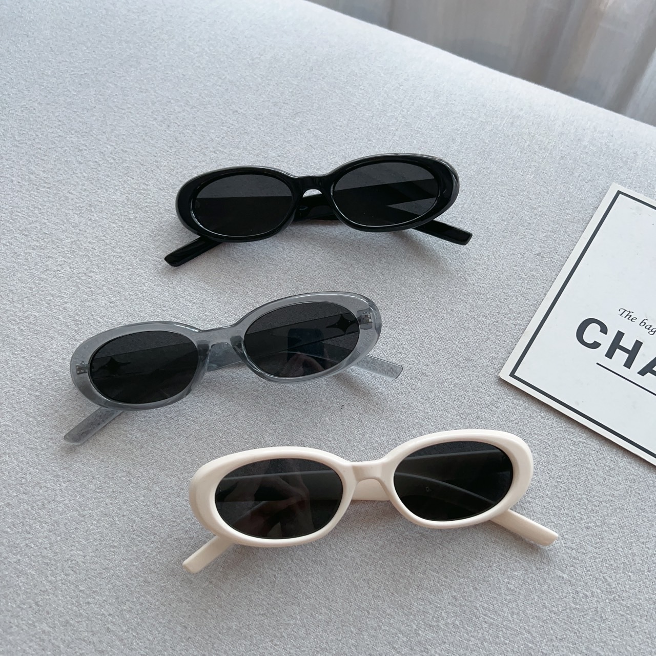 橢圓貓眼膠框墨鏡/三色