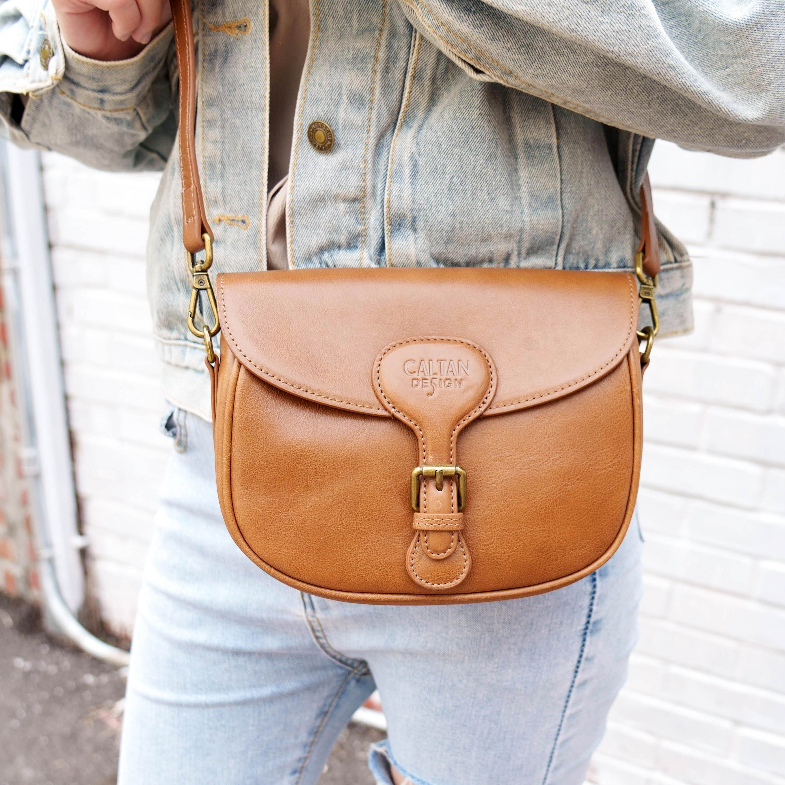 真皮率性馬鞍包-ht(234023ht)