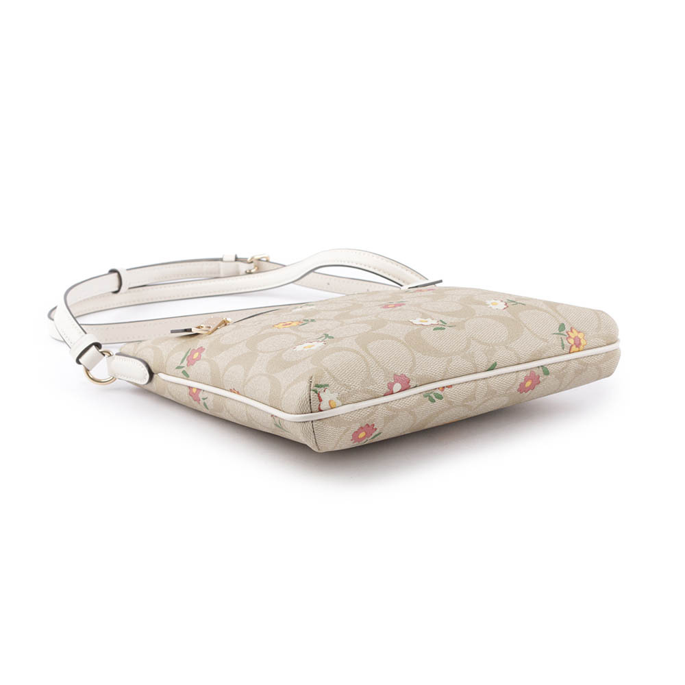 【COACH】Rowan 小花圖案拉鍊口袋迷你方形斜背包(淺卡其)