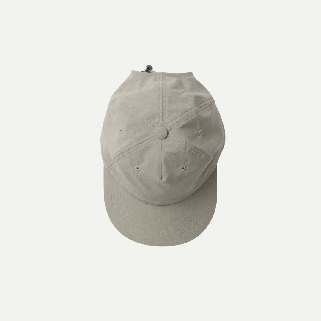 Houdini Daybreak Cap-in between green