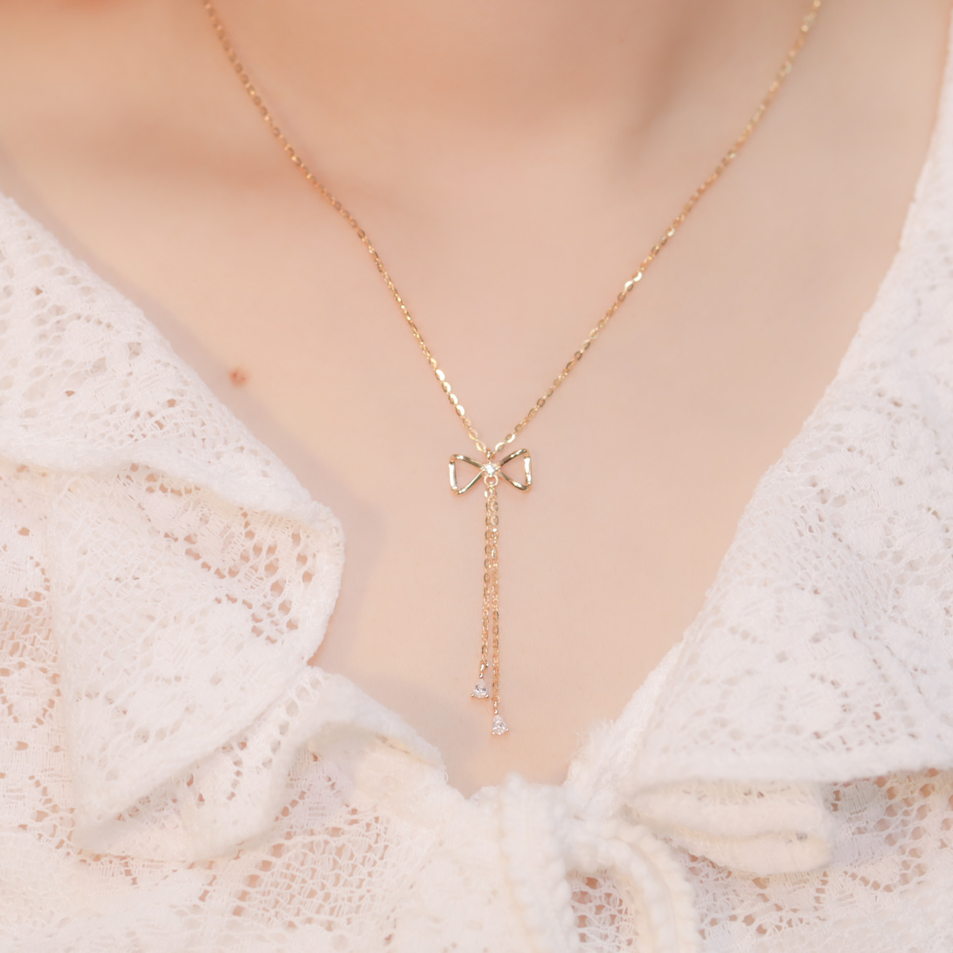 | 925 Silver | Bow With Tassel Necklace | NE0244 |