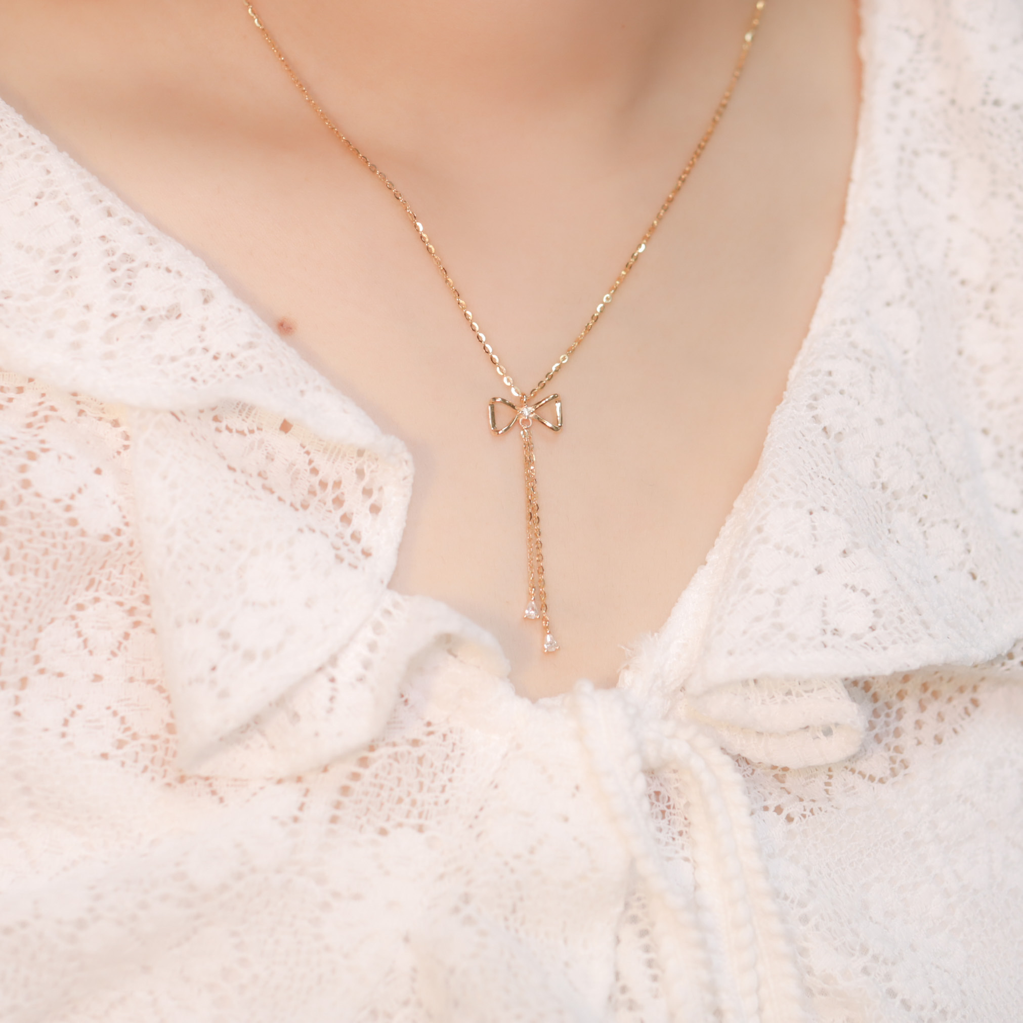 | 925 Silver | Bow With Tassel Necklace | NE0244 |