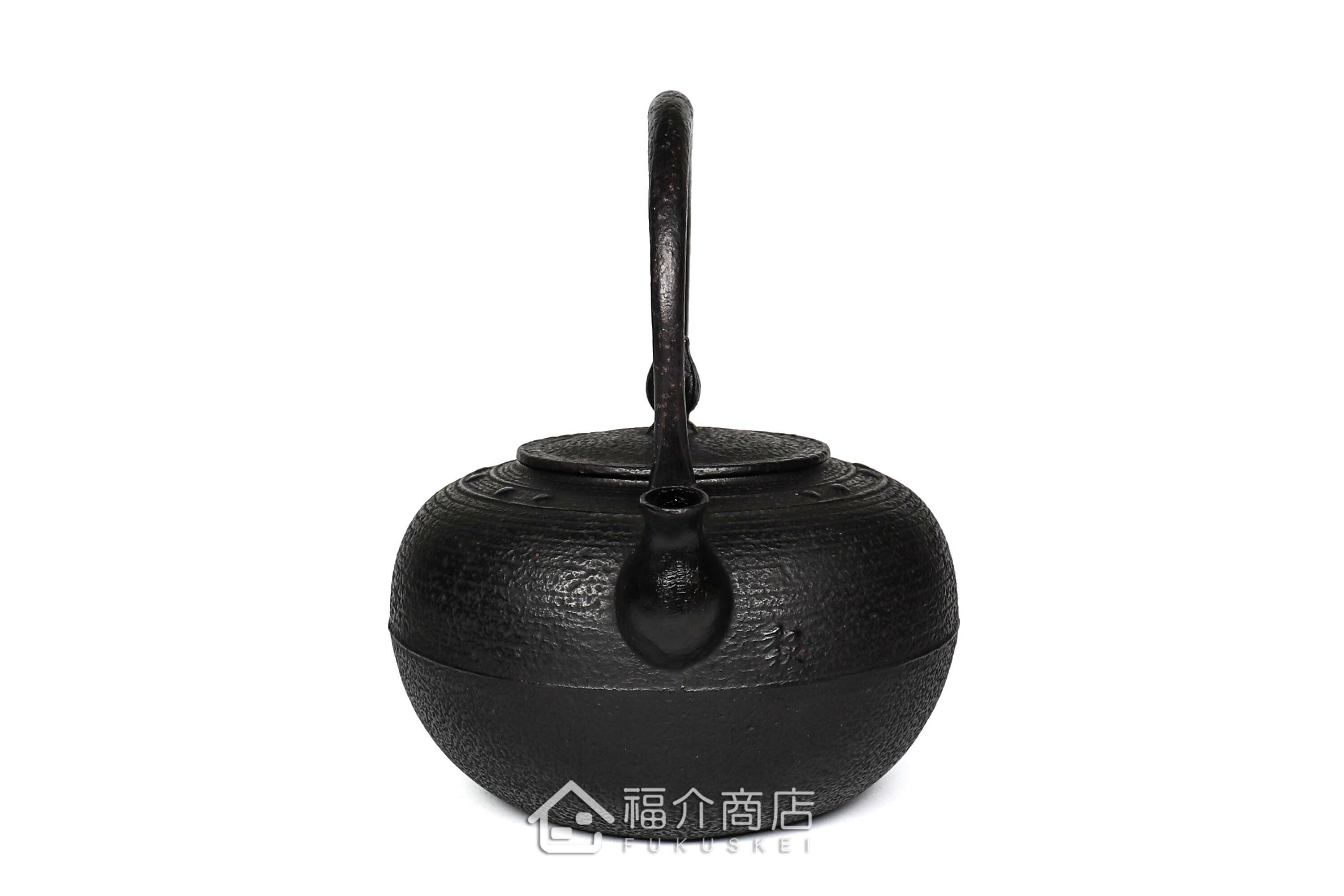 煮水泡茶用的柚子型鐵壺