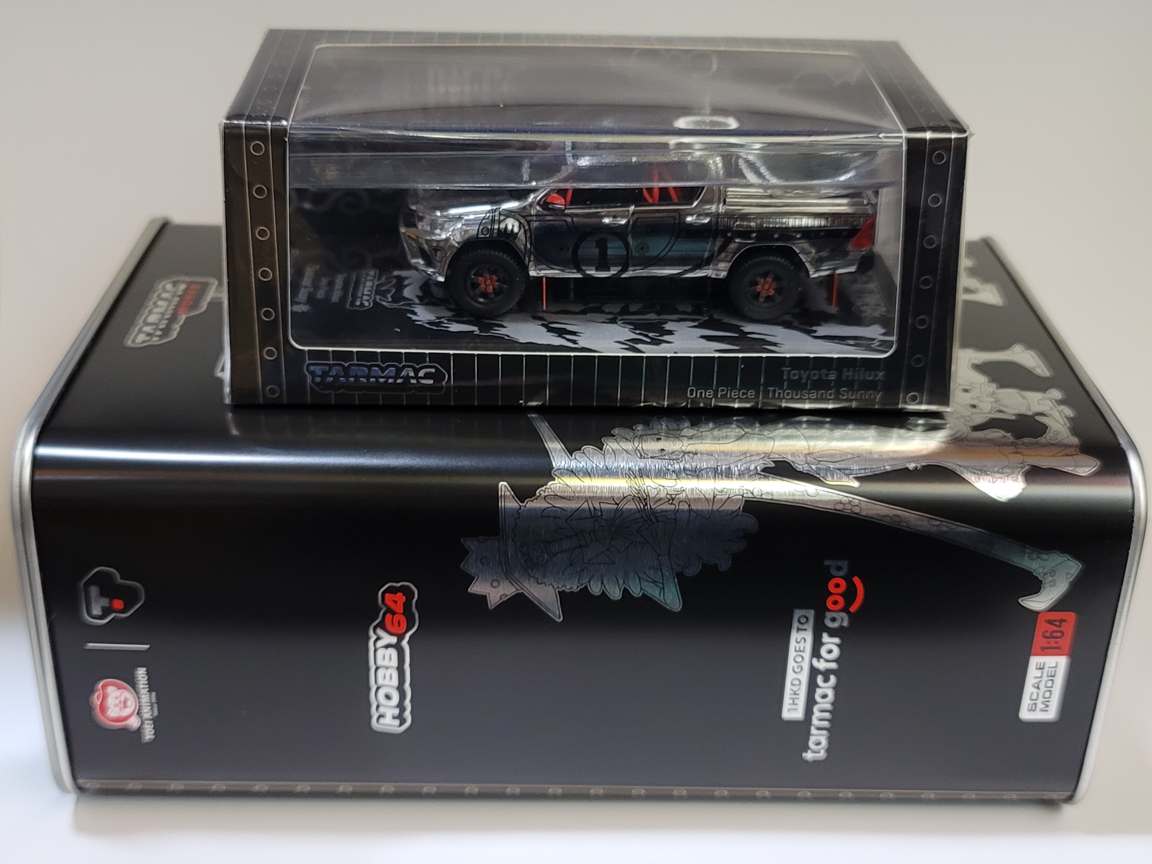 Tarmac 1/64 Tarmac Works x One Piece Toyota Hilux