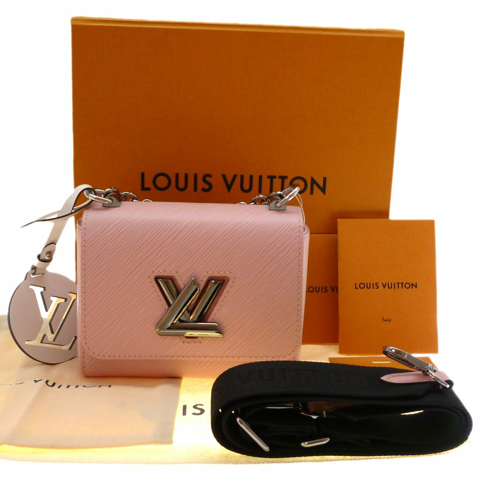 Compact twist mini Louis Vuitton in bright pink and a matching