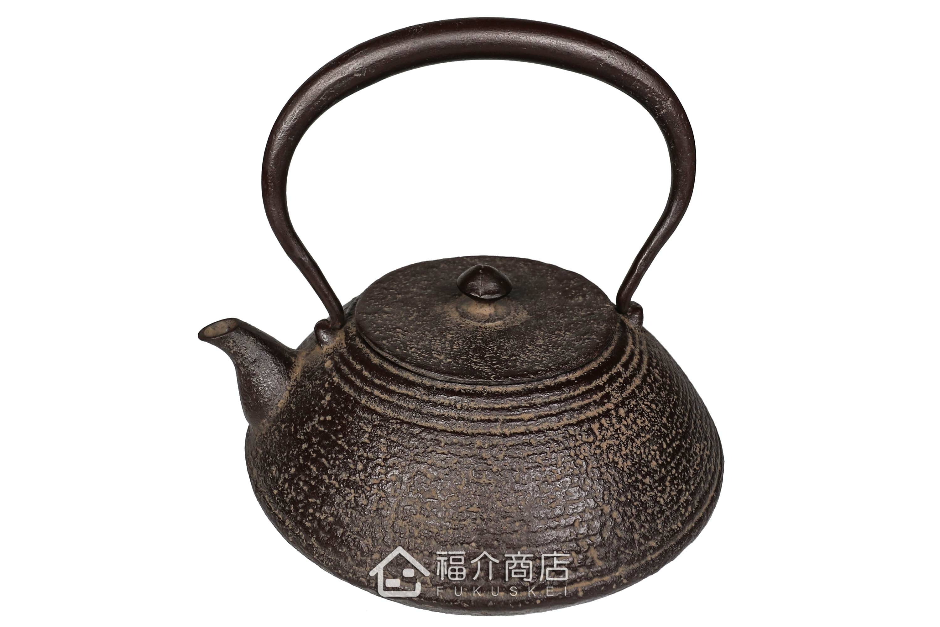 煮水泡茶用的鐵壺，壺身設計成石庭紋