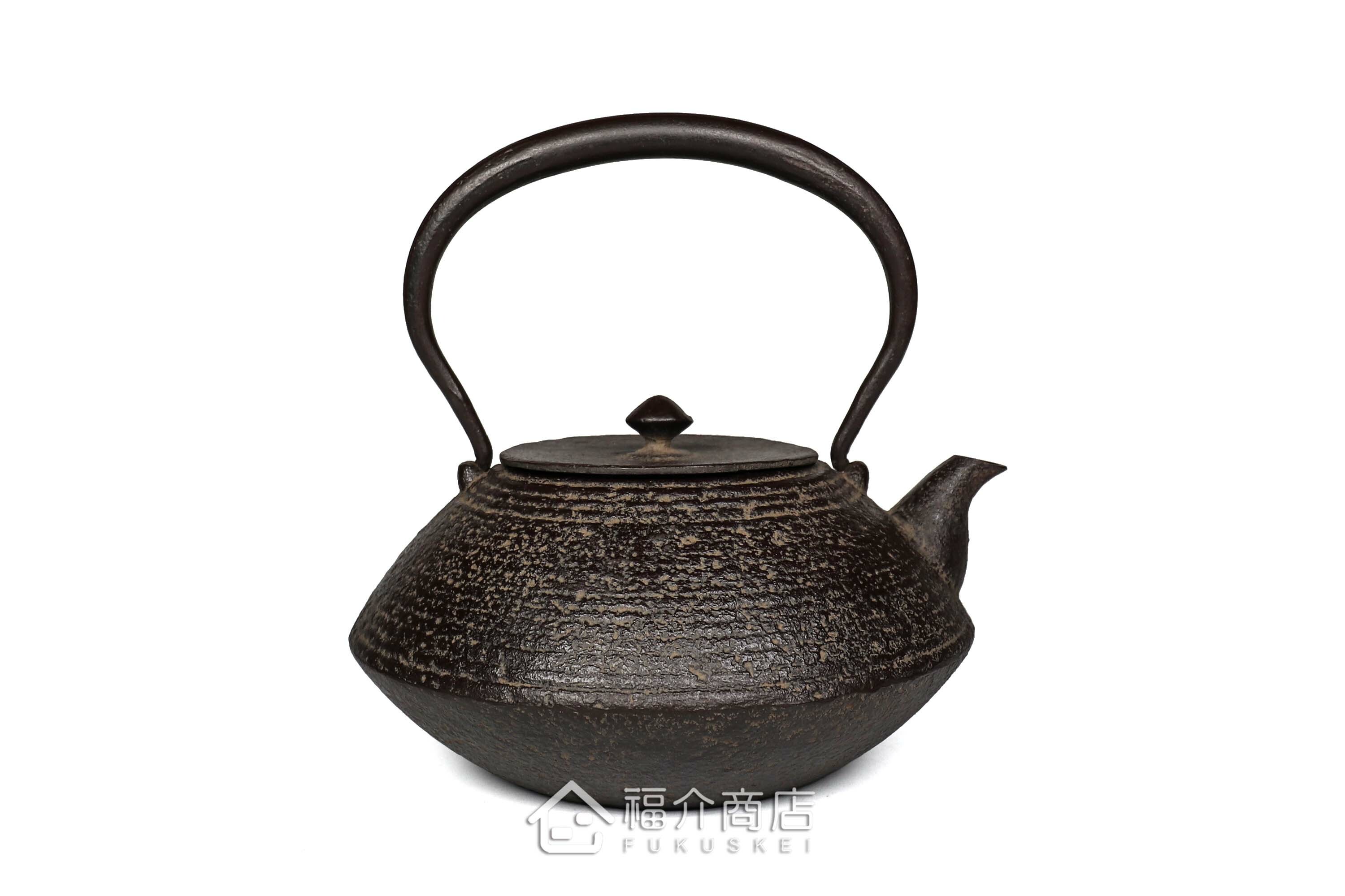 煮水泡茶用的鐵壺，壺身設計成石庭紋