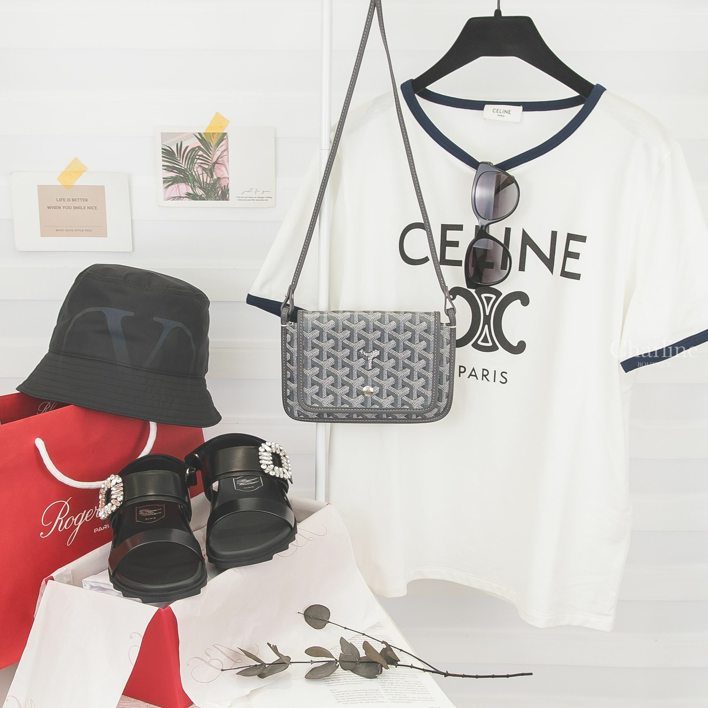Goyard 灰色小牛皮肩背包,Roger Vivier 黑色皮革銀色水晶方釦涼鞋,Chanel 黑色蝴蝶型灰色鏡片黃字側邊黑CC太陽眼鏡,Celine 白色黑字凱旋門印花海軍藍滾邊短袖棉T-Charline Boutique 精品代購