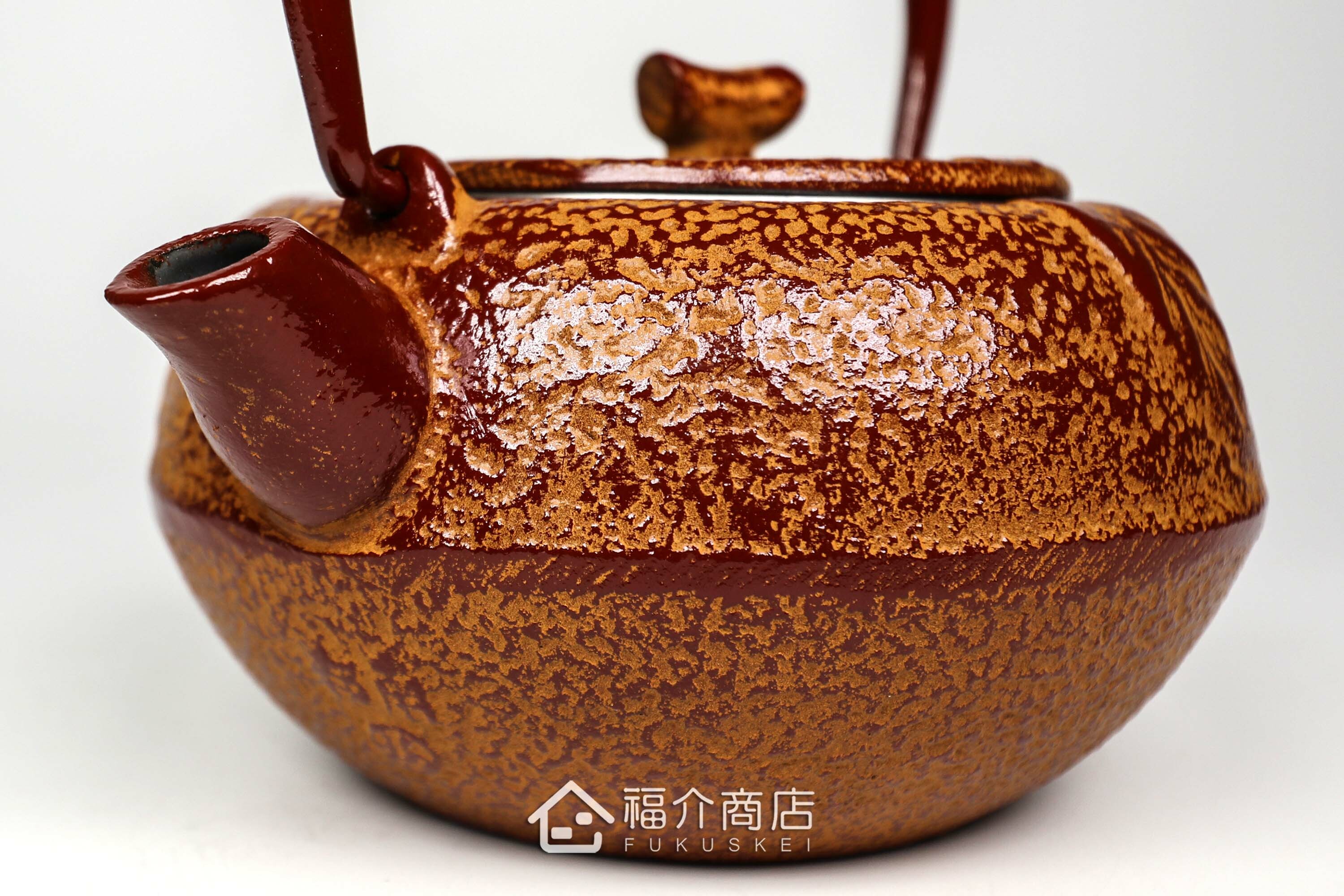 泡茶用的蜜柑造型鑄鐵茶壺