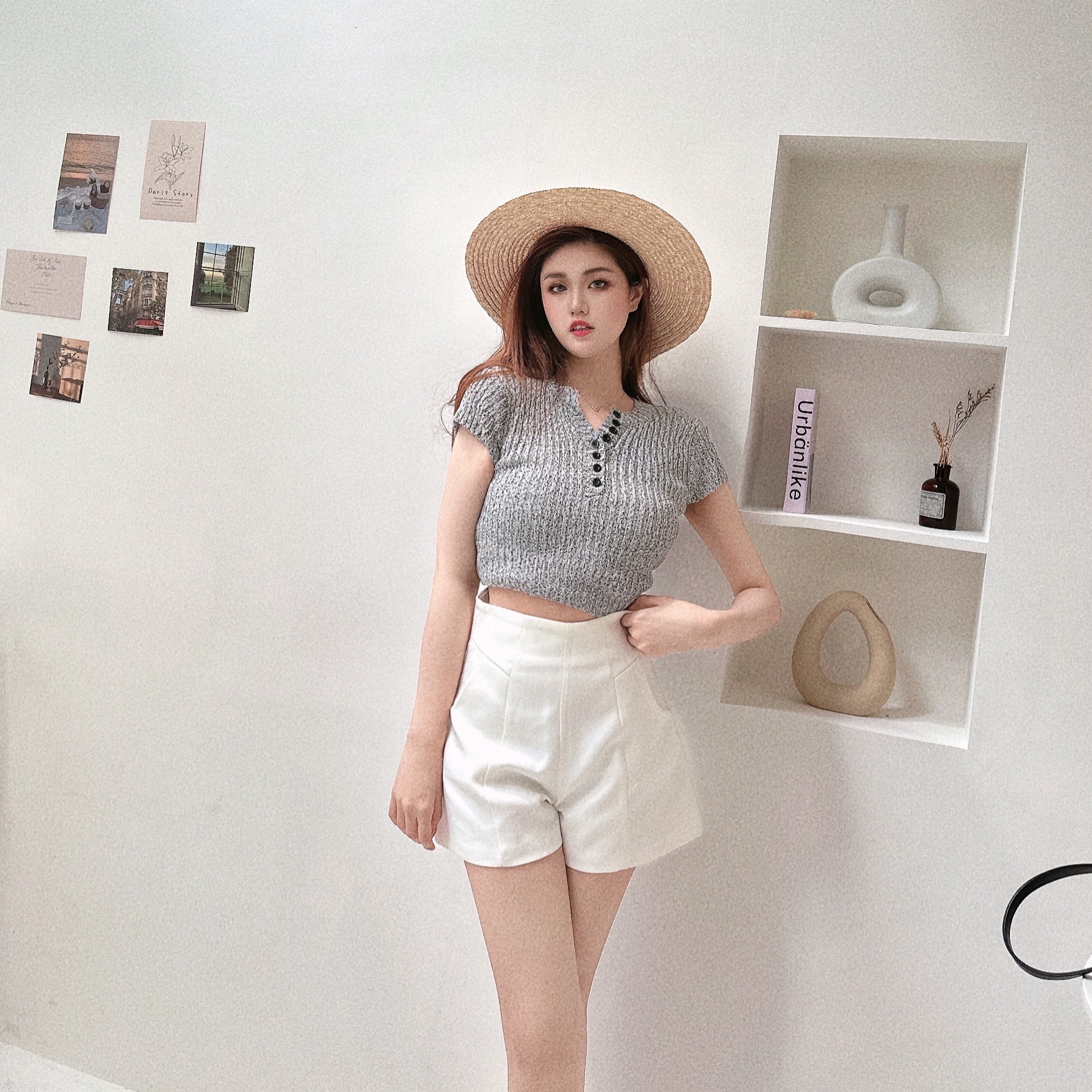 後簍空排釦墊肩針織上衣/二色