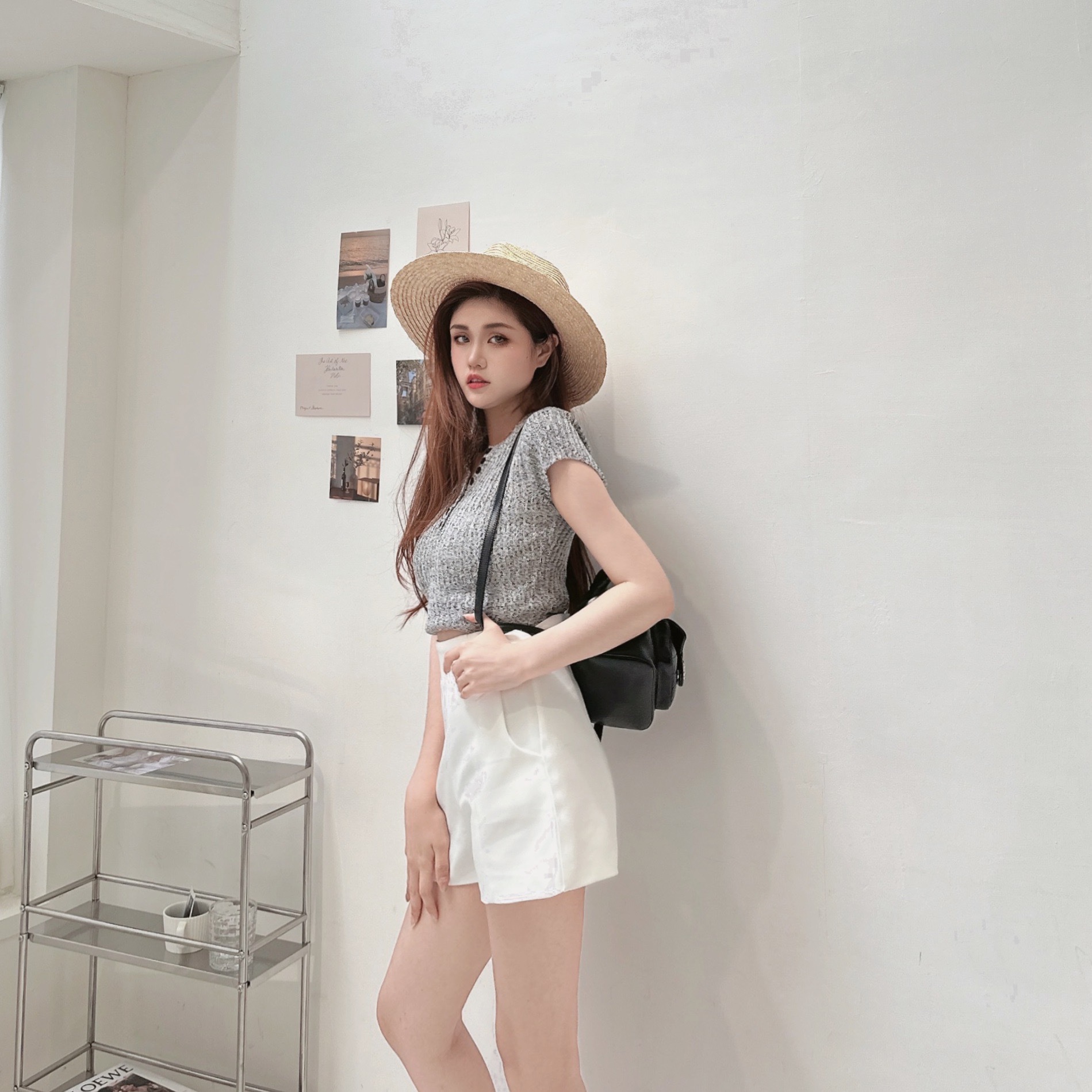 後簍空排釦墊肩針織上衣/二色